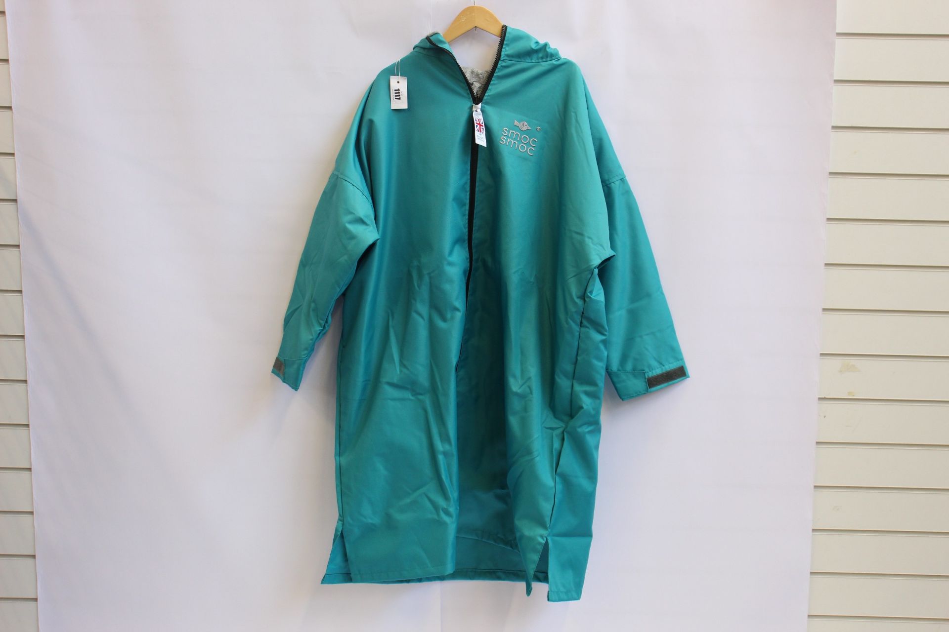 An as new Smoc Smoc full zip smock in teal and pebble grey (M - RRP £140).