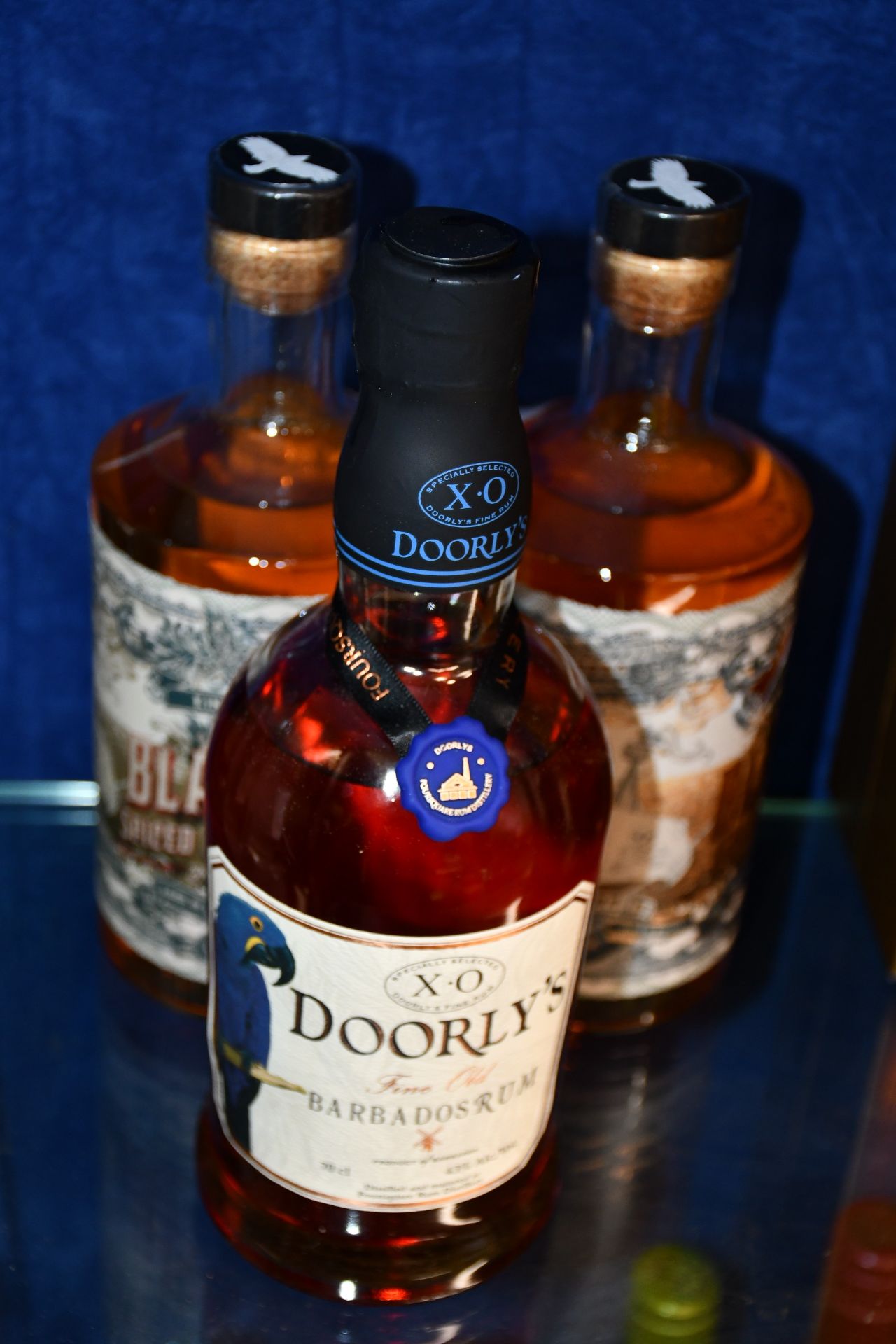 A Kinsale Blacks spiced Irish rum (700ml), a Kinsale Blacks Golden rum (700ml) and a Doorly's fine