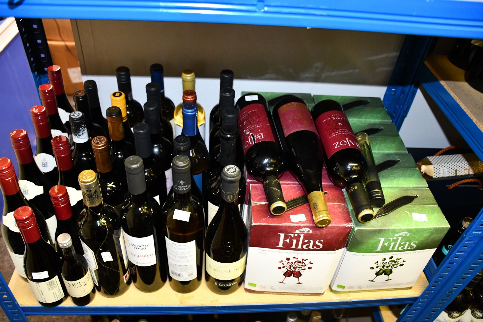 A quantity of assorted bottled wines and boxed red/white wines to include Famille Perrin Ventoux,
