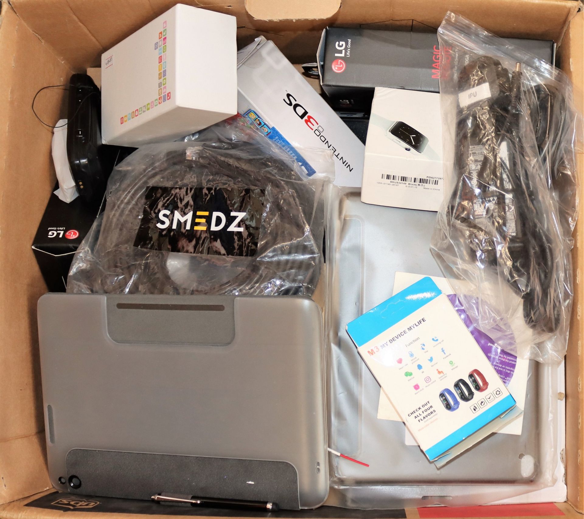 A box of assorted as new and pre-owned small electrical items and accessories (All items sold as