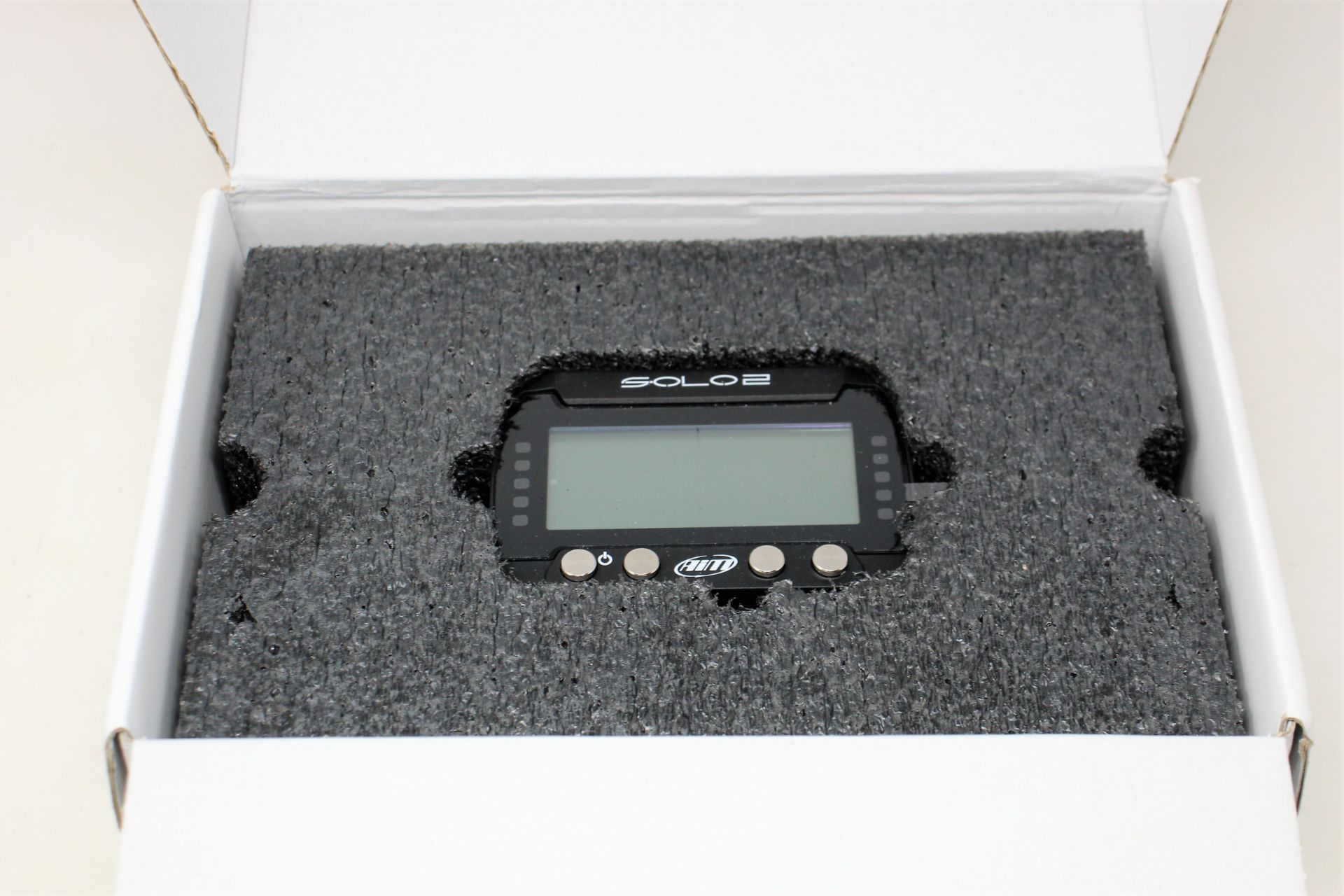 A boxed as new AIM Motorsport Solo 2 GPS Lap Timer (UK model). - Image 7 of 10