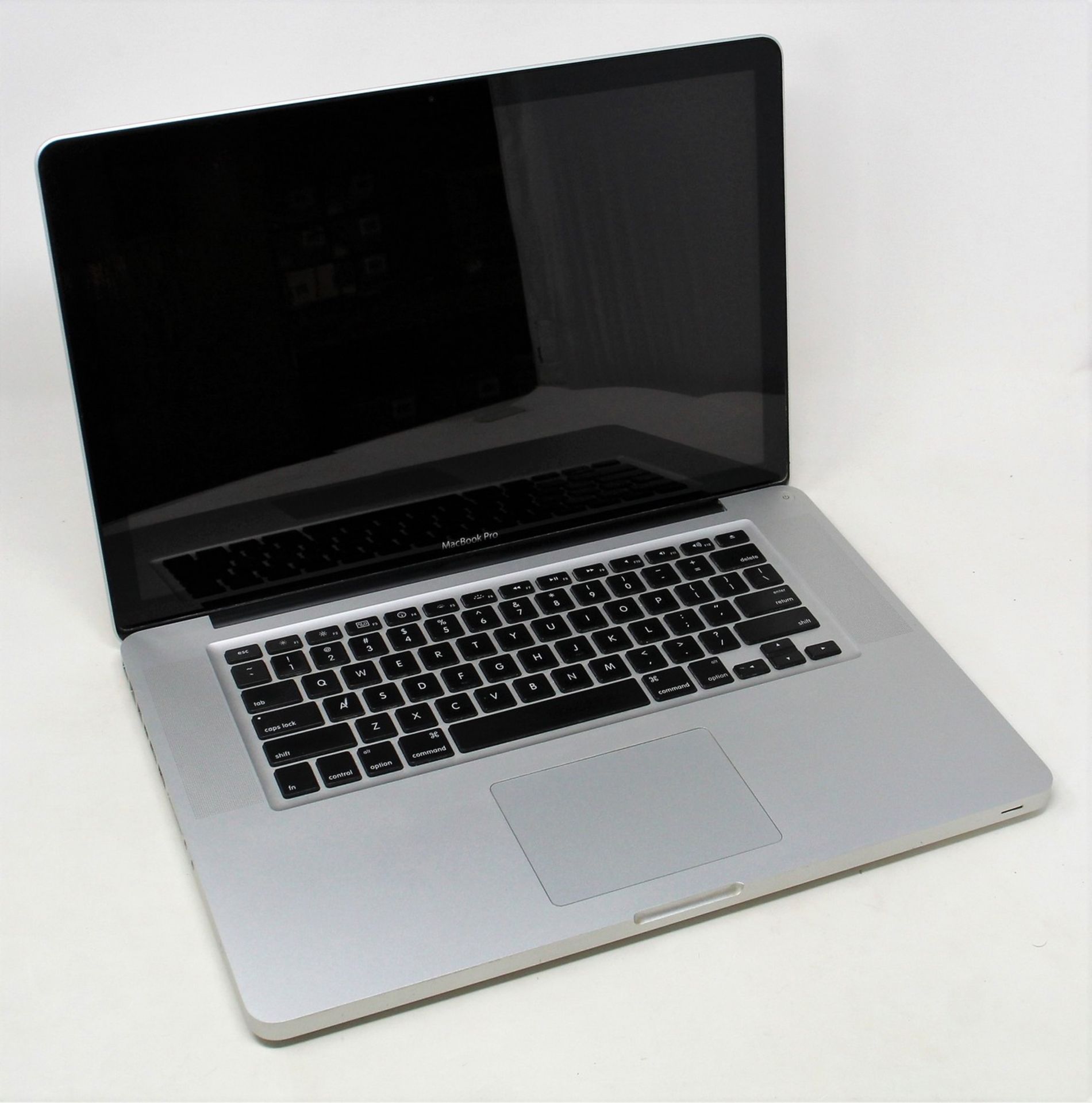 REPAIR OR SPARES - NO RAM - NO HARD DRIVE - A pre-owned 15" MacBook Pro (Early 2011) with Core i7