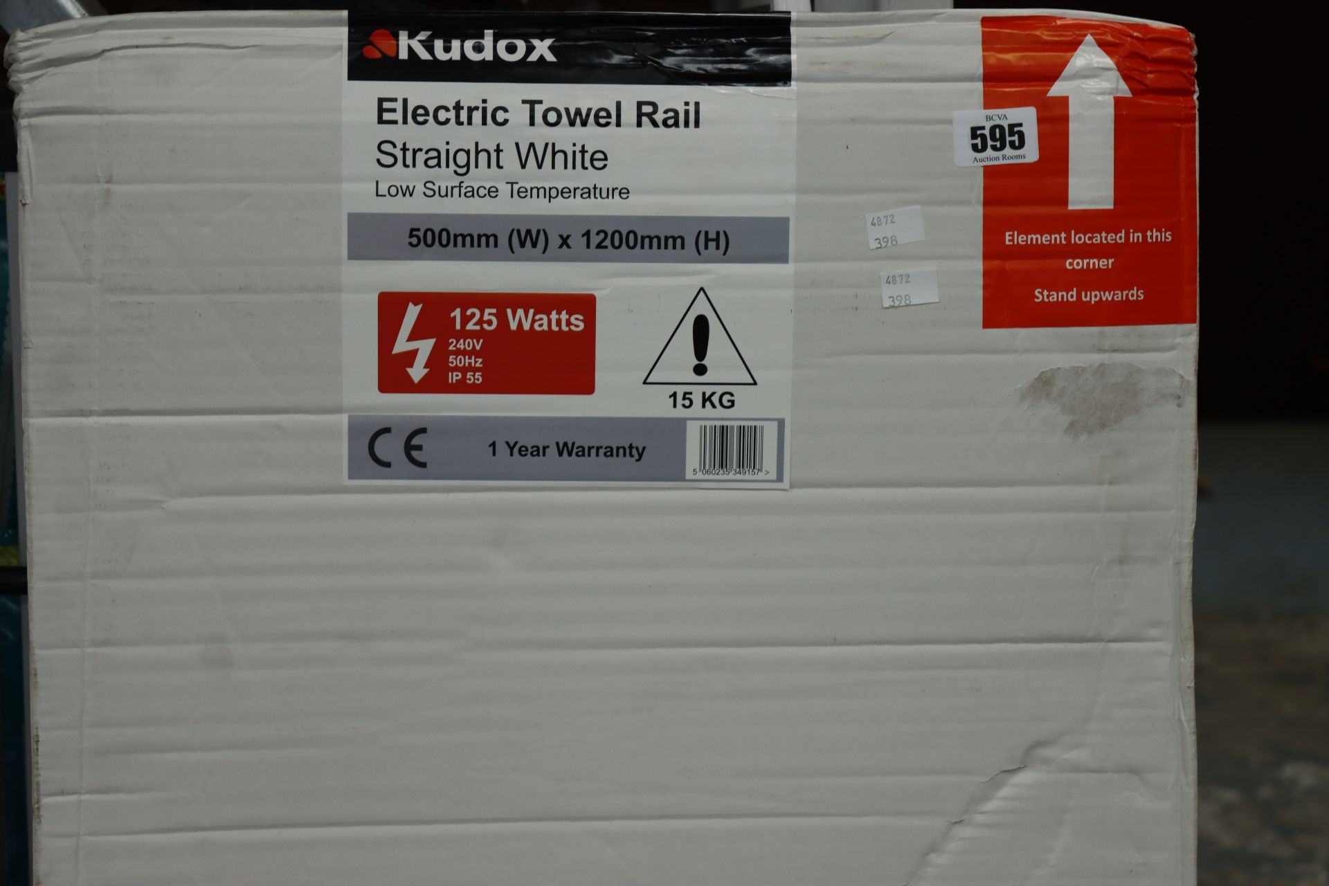 A boxed Kudox low surface temperature electric towel rail in straight white (1200 x 500mm).