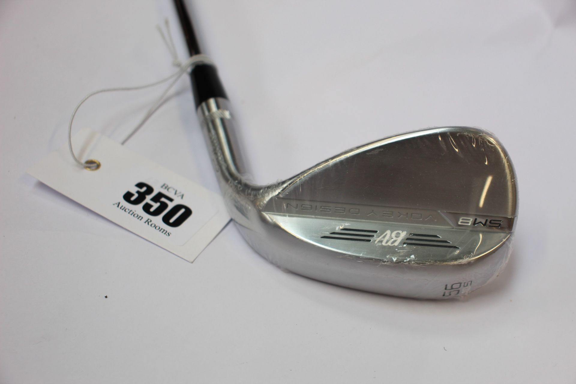An as new Titleist Vokey Design SM8 wedge 56/10S (Right handed).