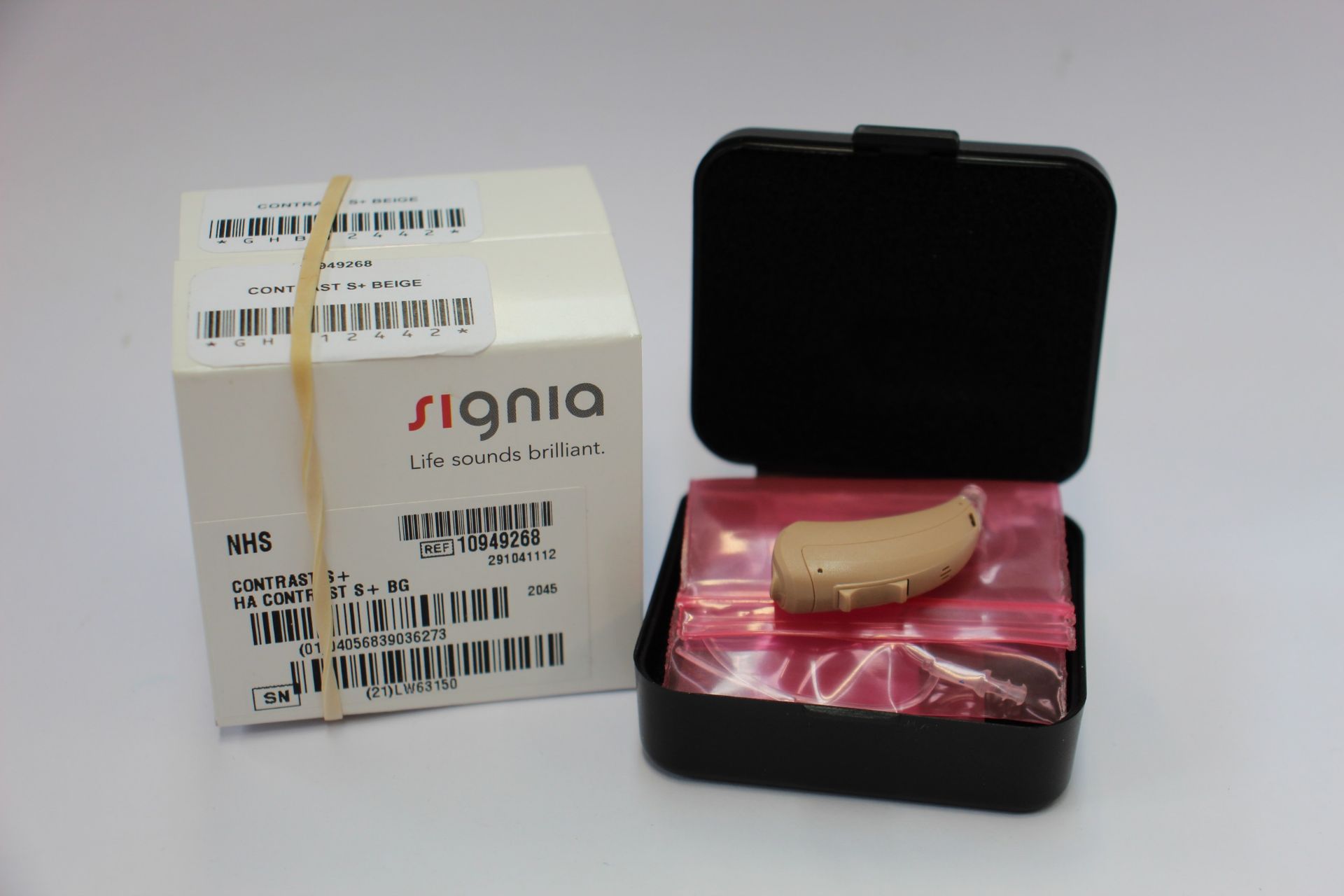 Two as new Signia contrast S + Beige (LW63156/LW63150) hearing aids.