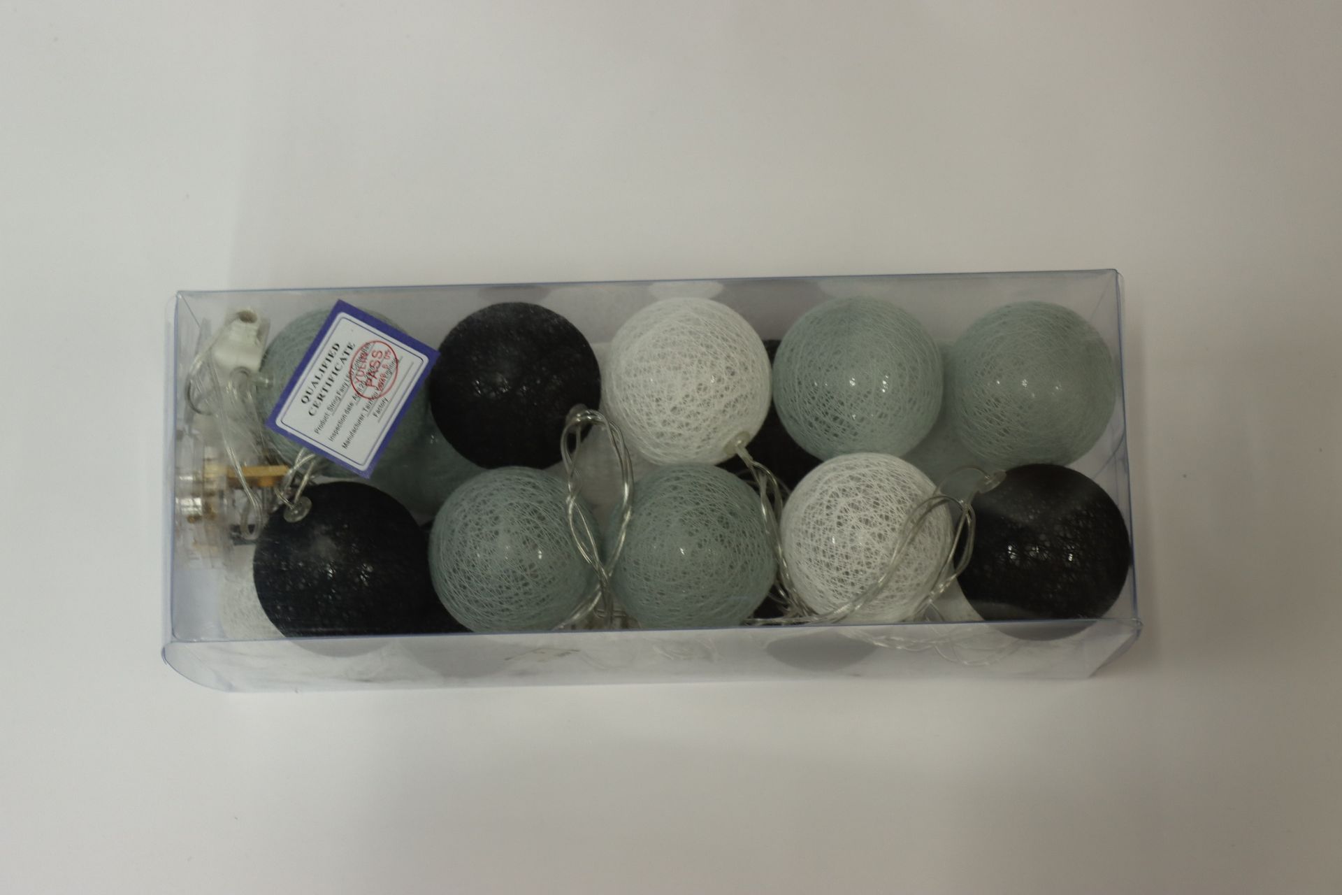 A large quantity of cotton ball LED string lights in various colours (approximately 100 items).