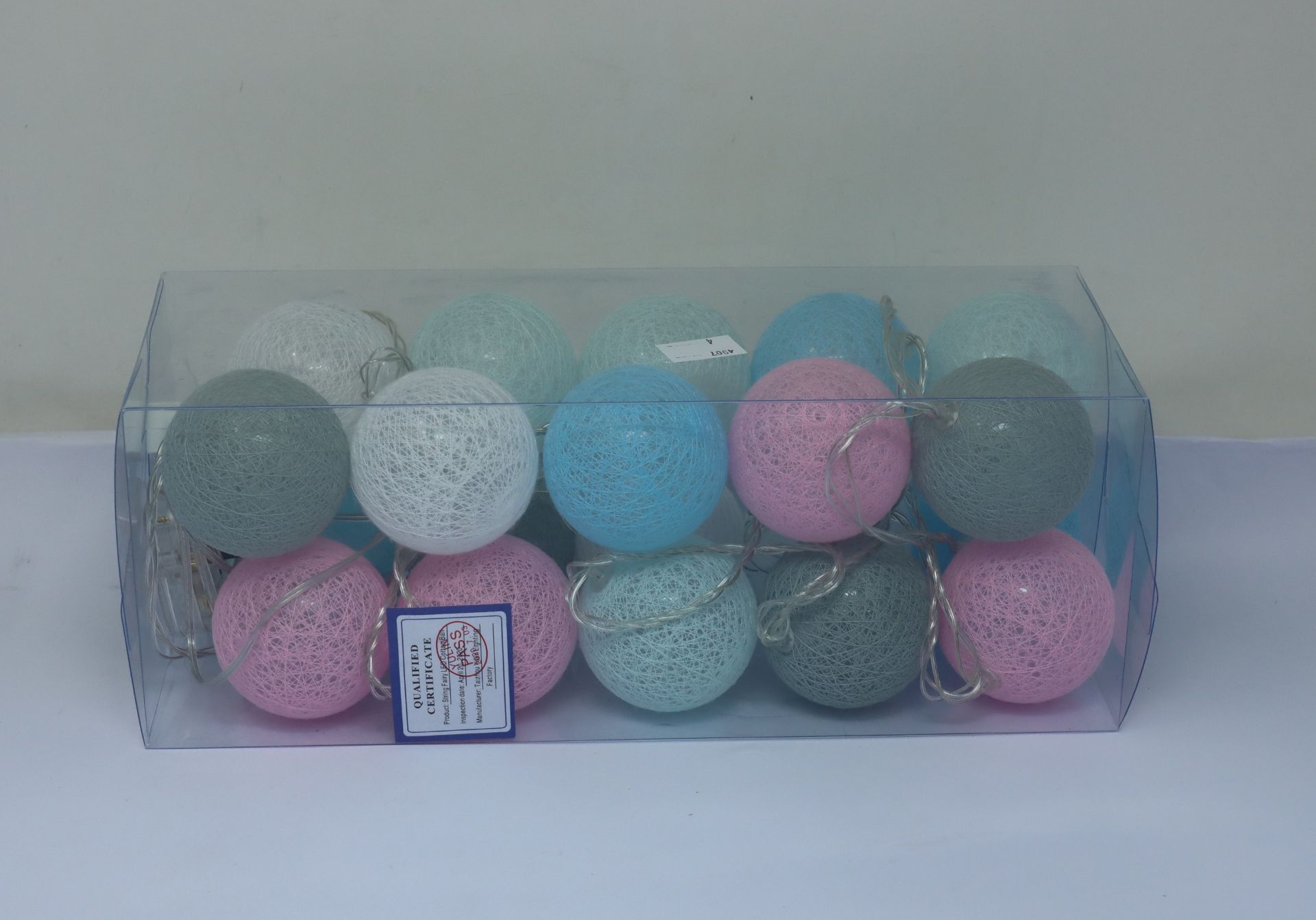 A large quantity of cotton ball LED string lights in various colours (approximately 100 items).