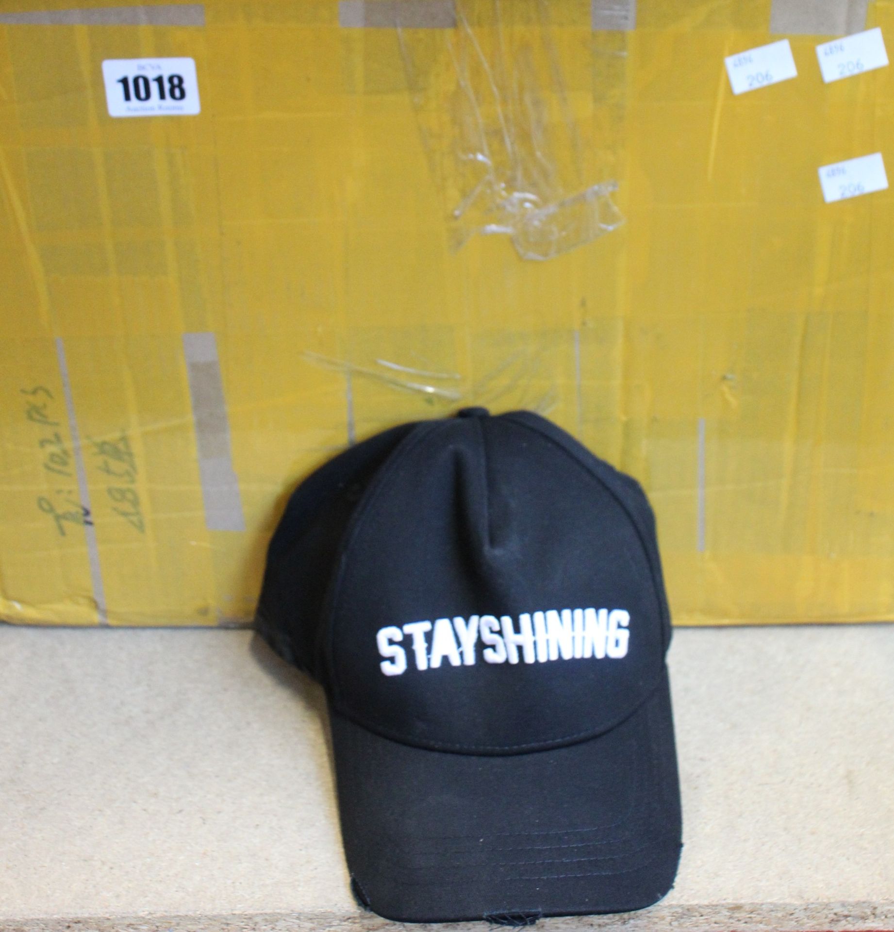 A quantity of as new Stay Shining baseball caps.