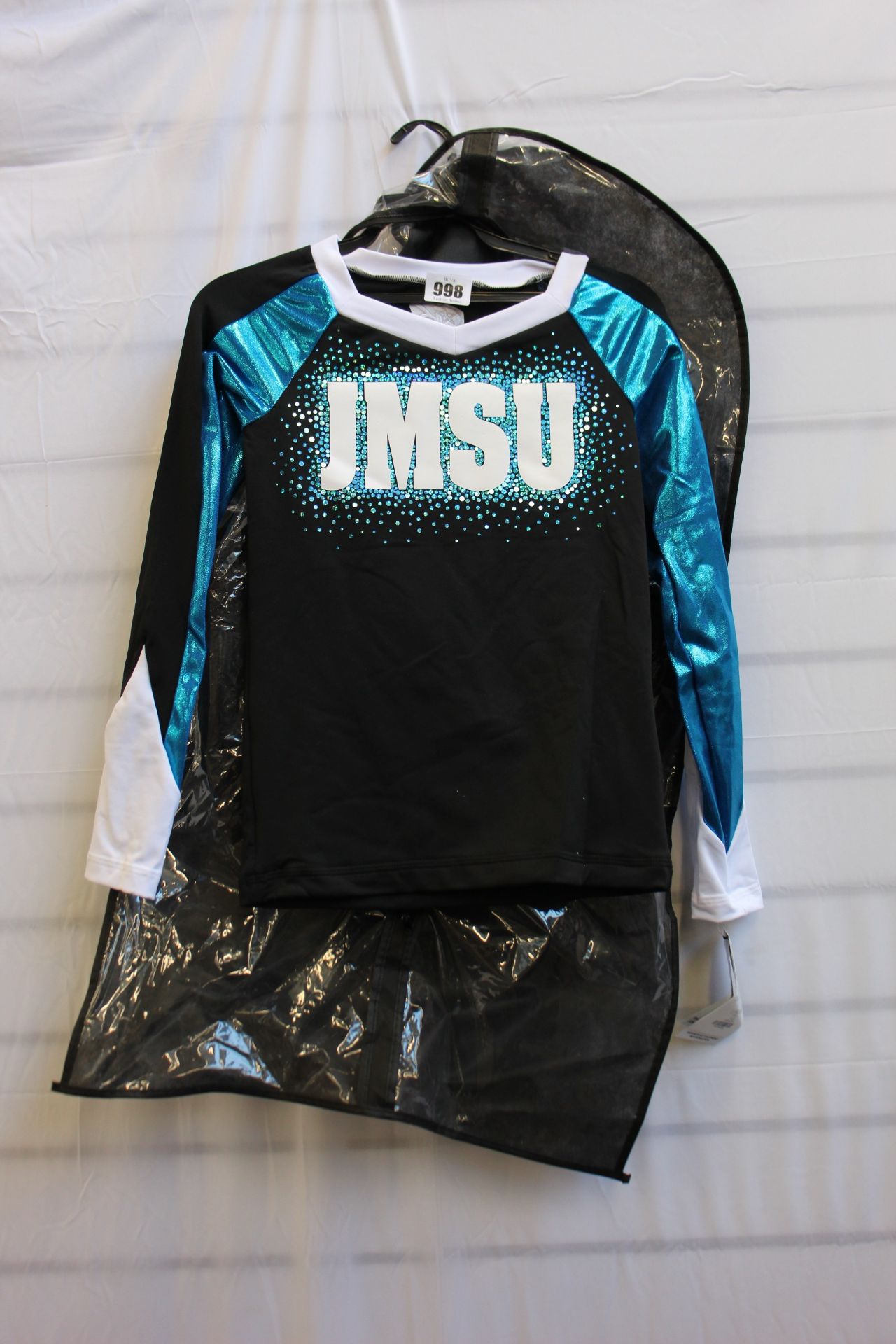 A quantity of as new GK All Star cheerleading costumes and shorts (Approximately 40 items).