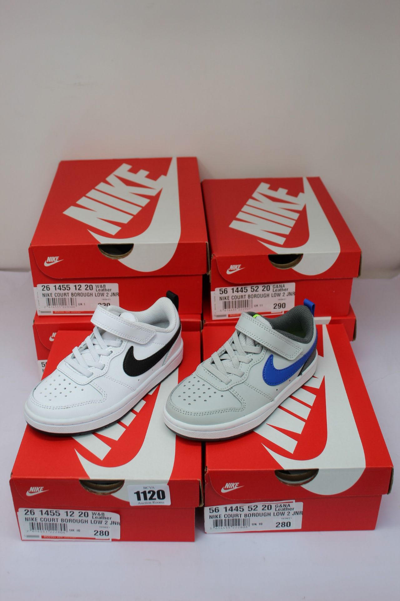 Six pairs of as new junior Nike Court Borough Low 2 trainers (Kids UK 10, 11, 13, 1 , 2).