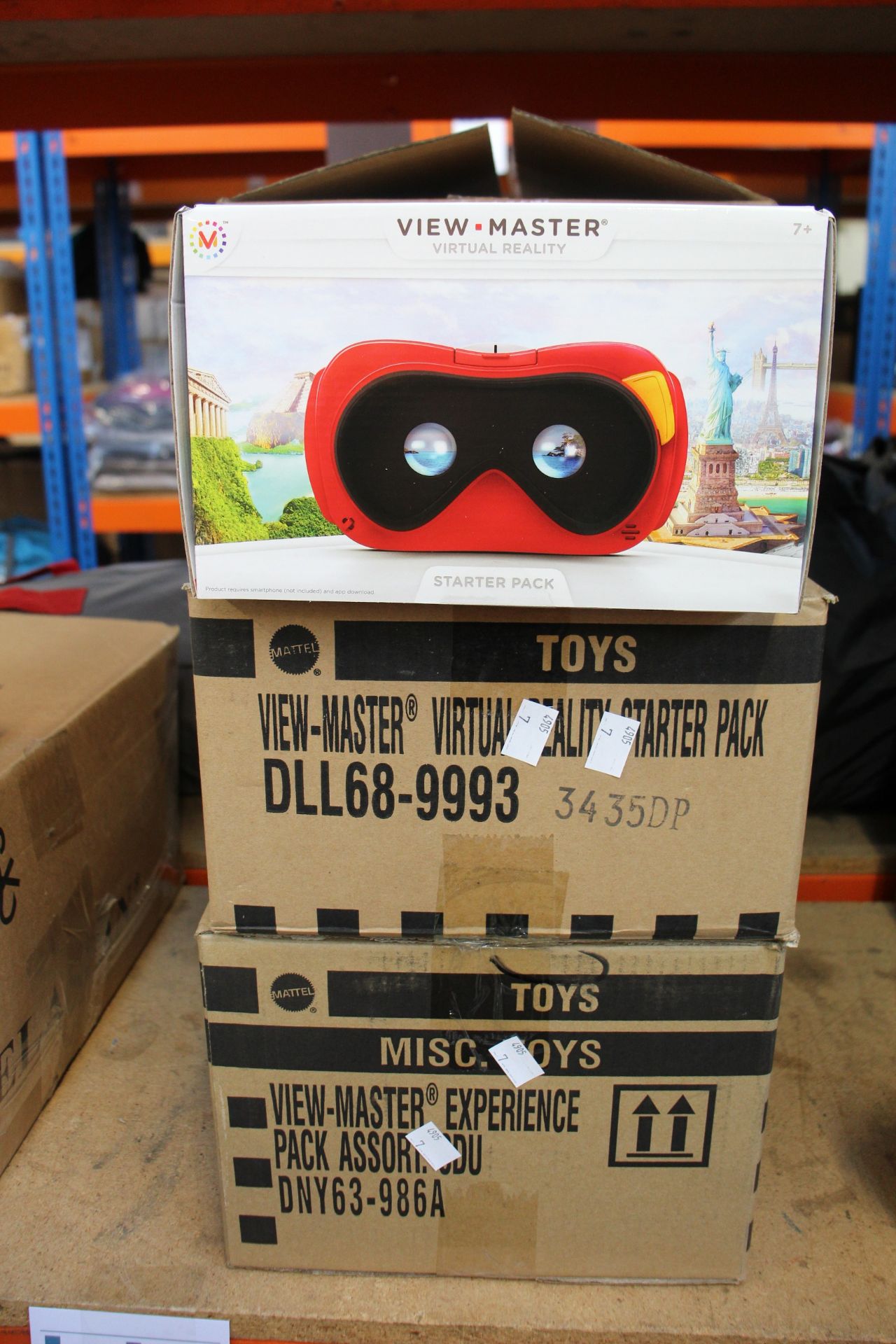 A box of View Master virtual reality experience packs to include space, wildlife and destinations