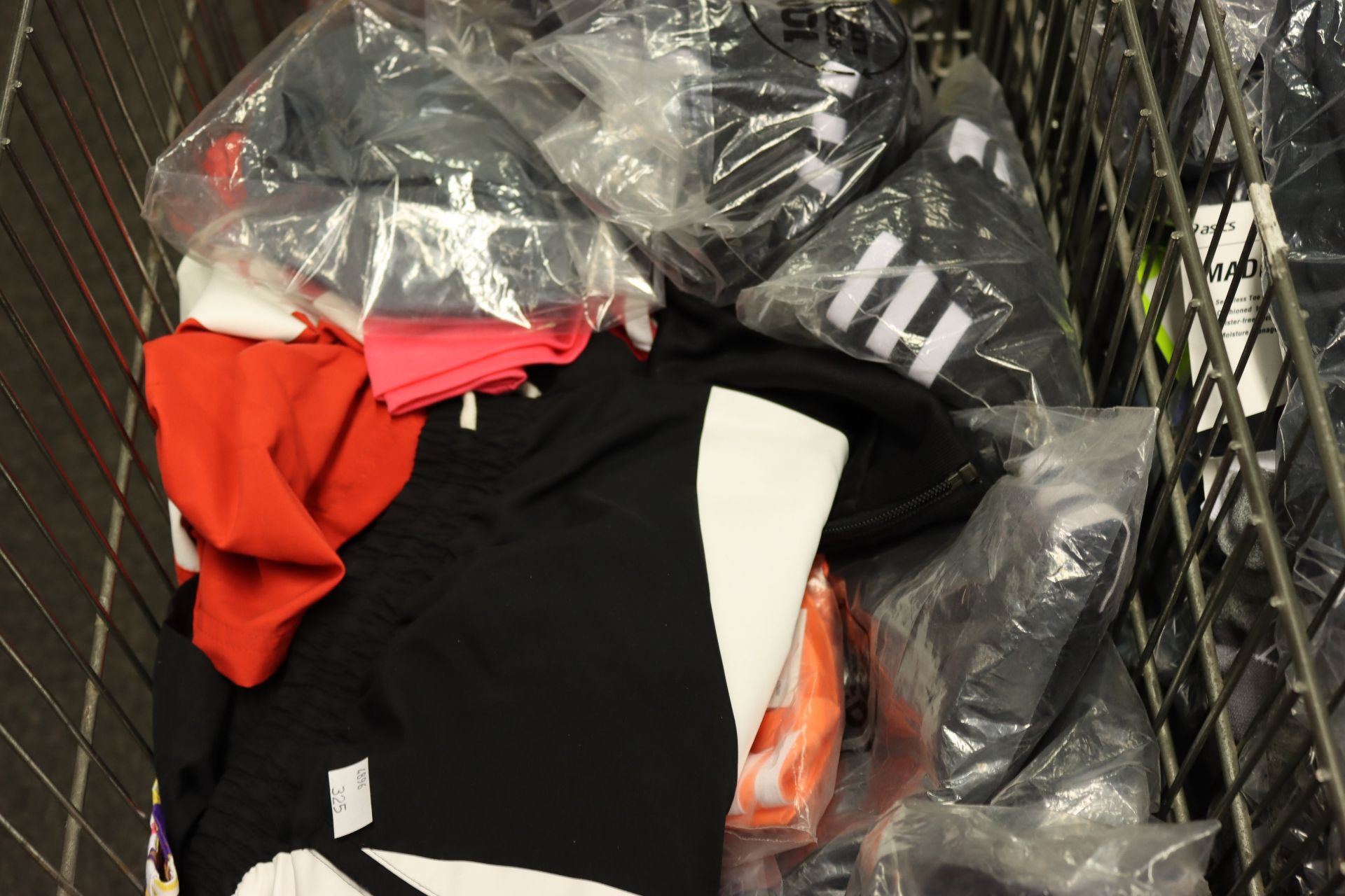 A quantity of as new Adidas sportswear.