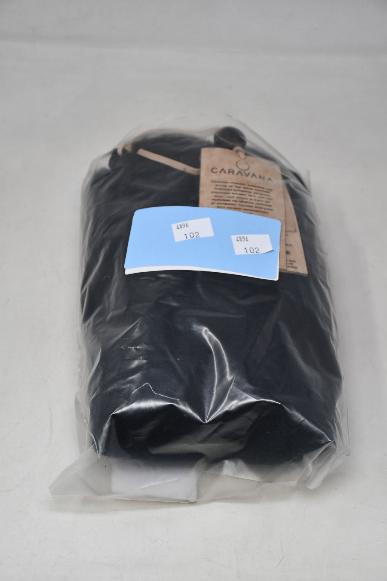 An as new Caravana + Butub fringed cotton-gauze kaftan in black (One size - RRP £288).