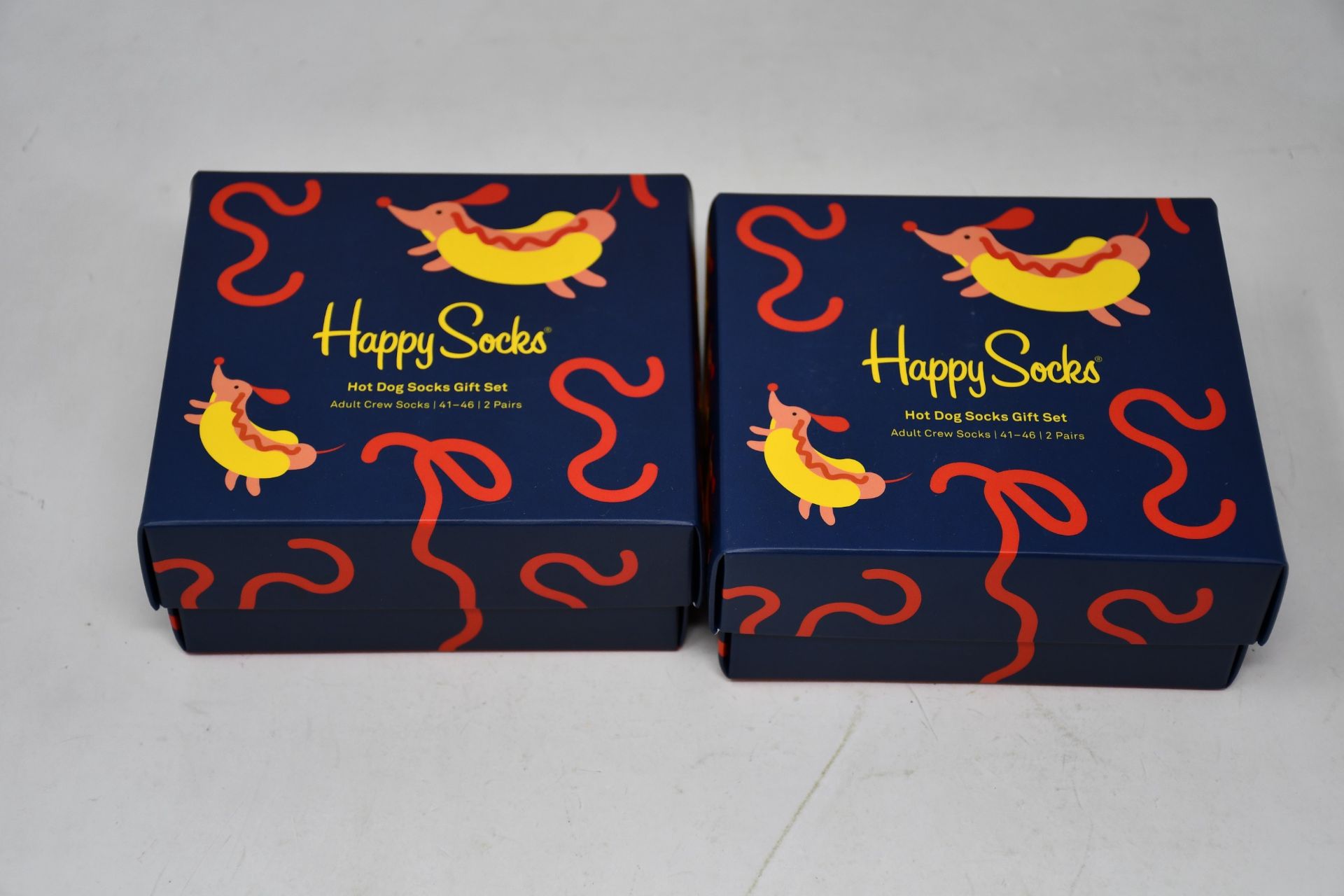 Fifteen boxed as new Happy Socks hot dog socks gift sets.
