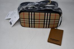 An as new Burberry vintage check camera bag with dust bag (RRP $830).