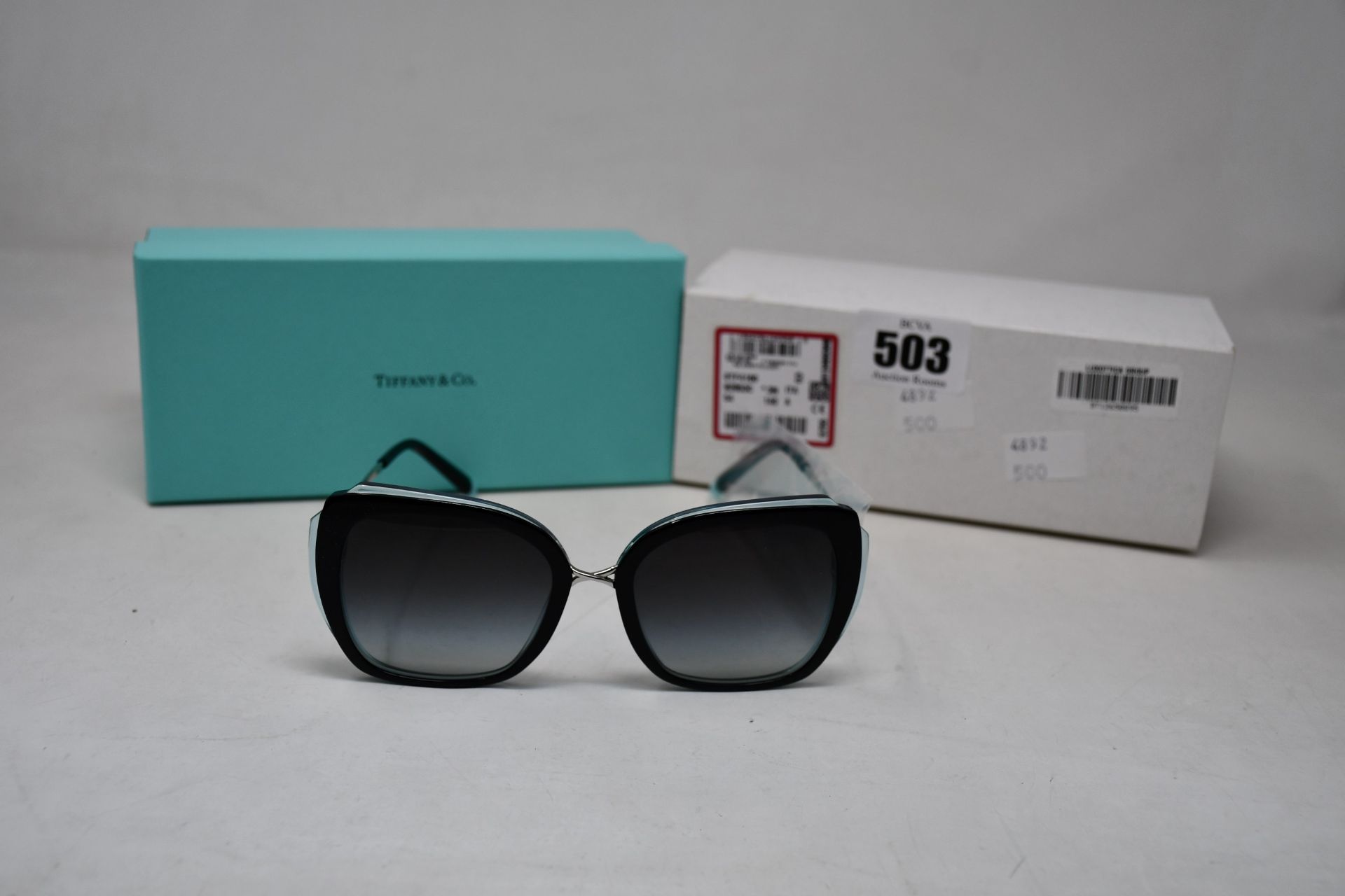 A pair of ladies boxed as new Tiffany & Co. Sunglasses (TF4160 82853C 54).