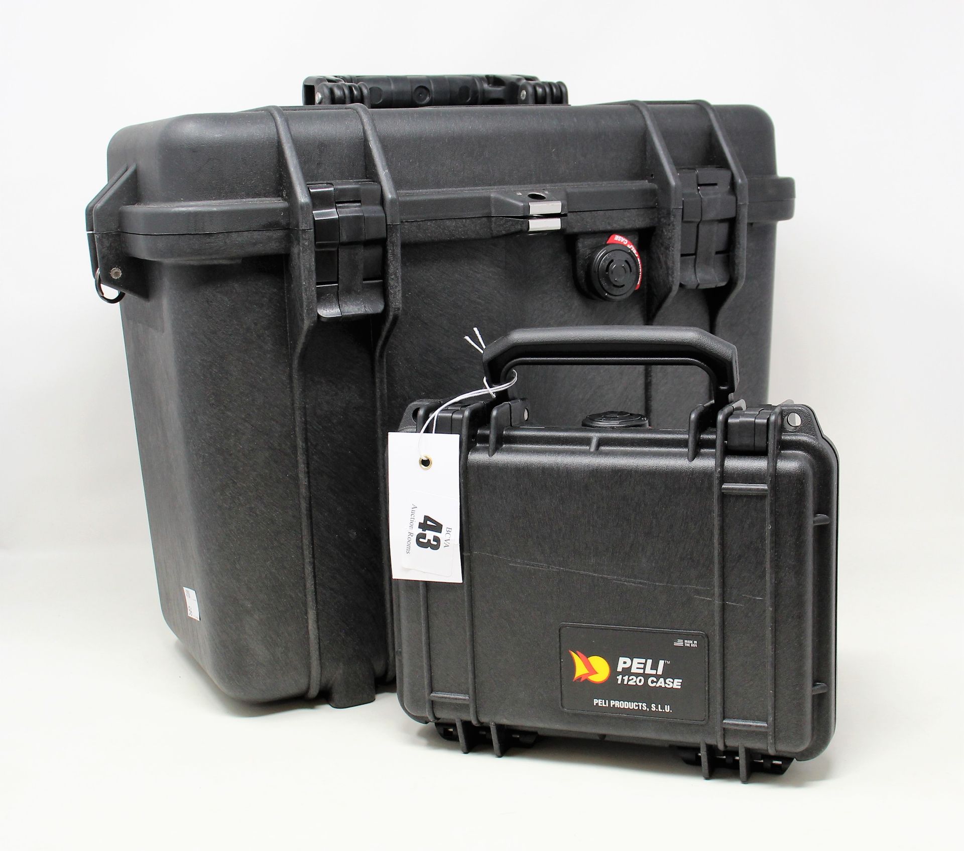 A pre-owned Peli 1430 Protector Top Loader Case and a pre-owned Peli 1120 Protector Case (Both