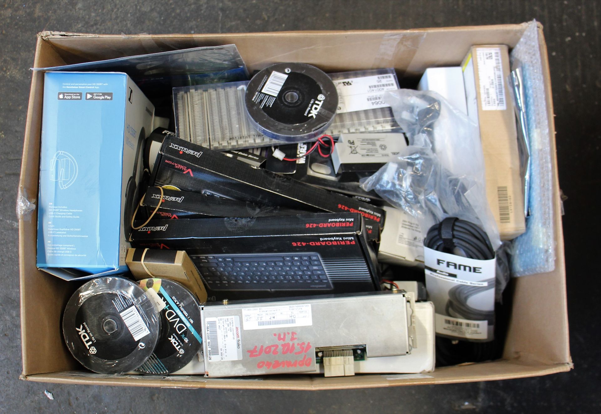A box of assorted as new and pre-owned small electrical items and accessories (All items sold as
