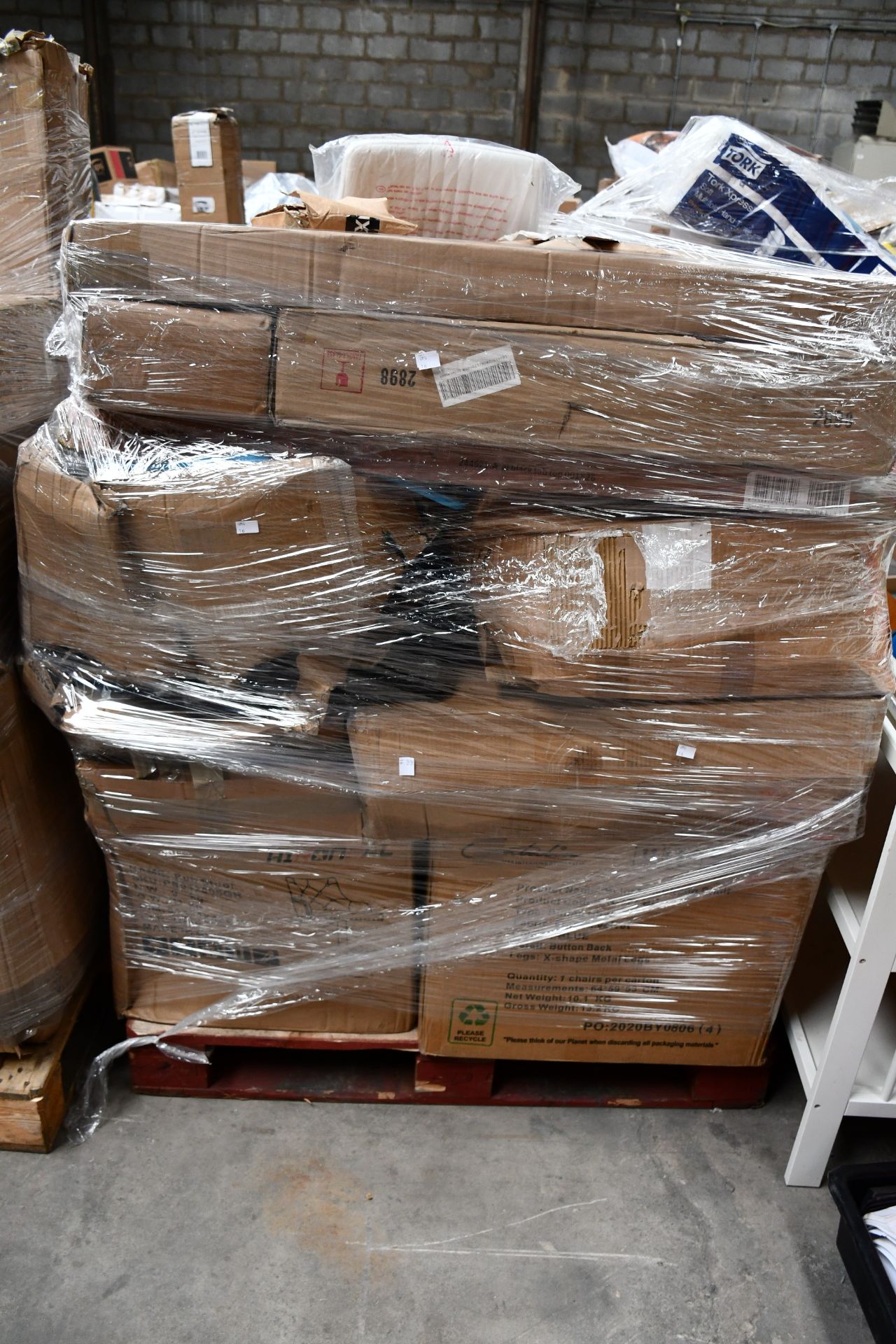 A pallet of assorted flat packed furniture and related items (BCVA cannot guarantee to be