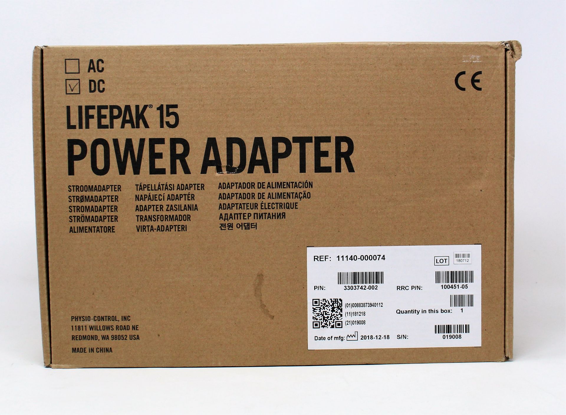 A boxed as new Physio-Control LIFEPAK 15 DC Power Adapter (P/N: 11140-000074) (Box opened, some