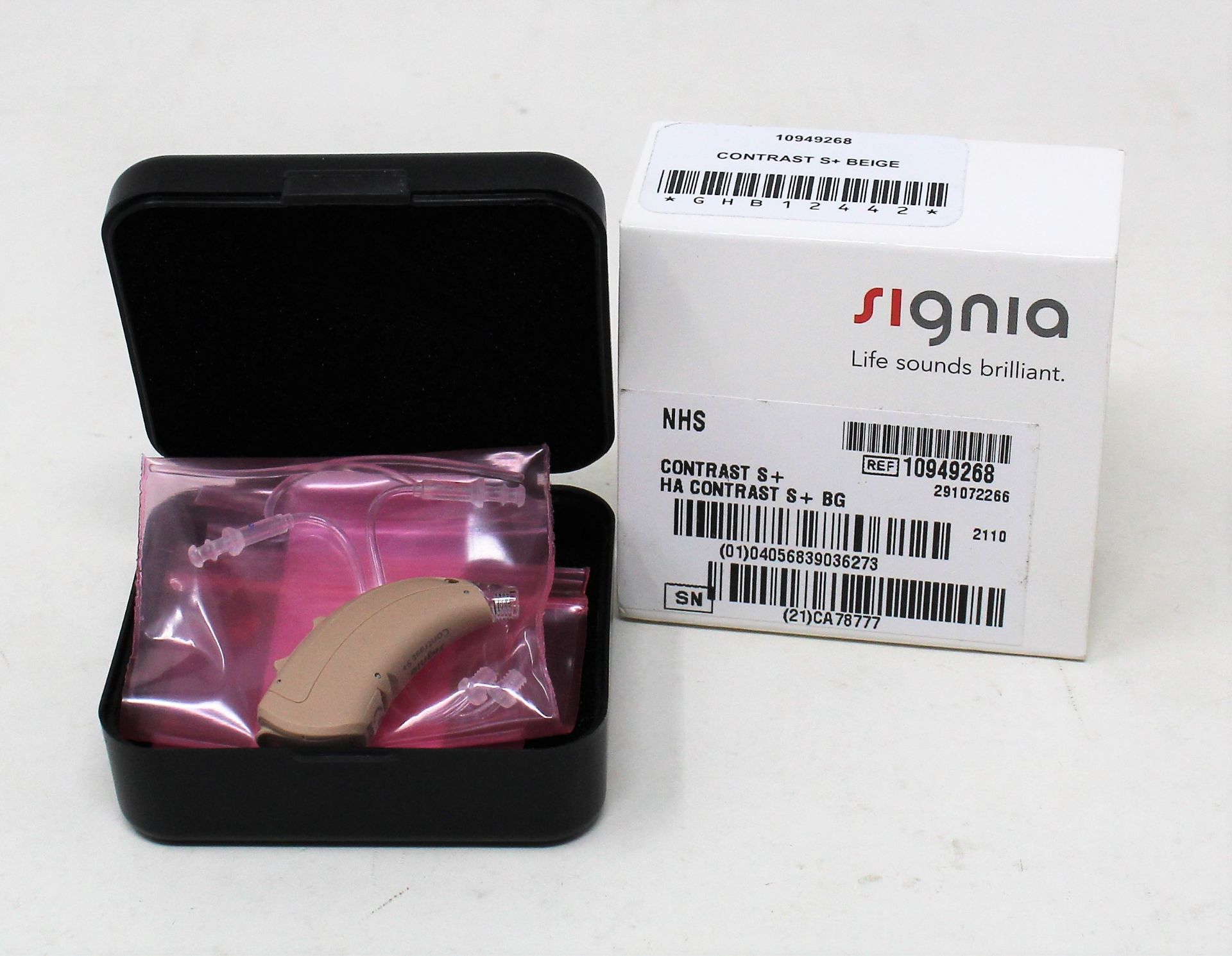 An as new Signia Contrast S+ Hearing Aid in Beige (REF: 10949268).