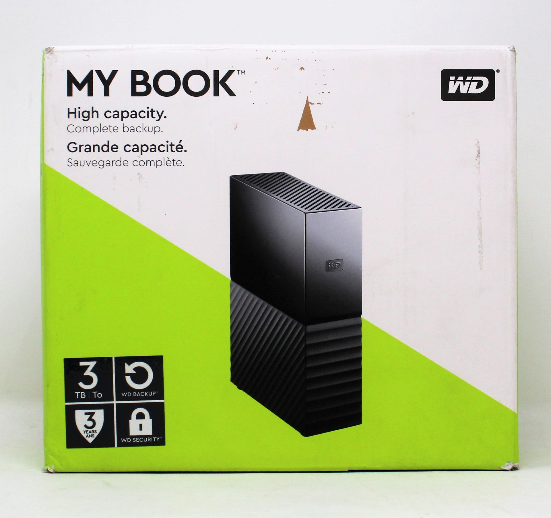 A boxed as new WD My Book 3TB desktop storage drive in black (Outer box damaged)