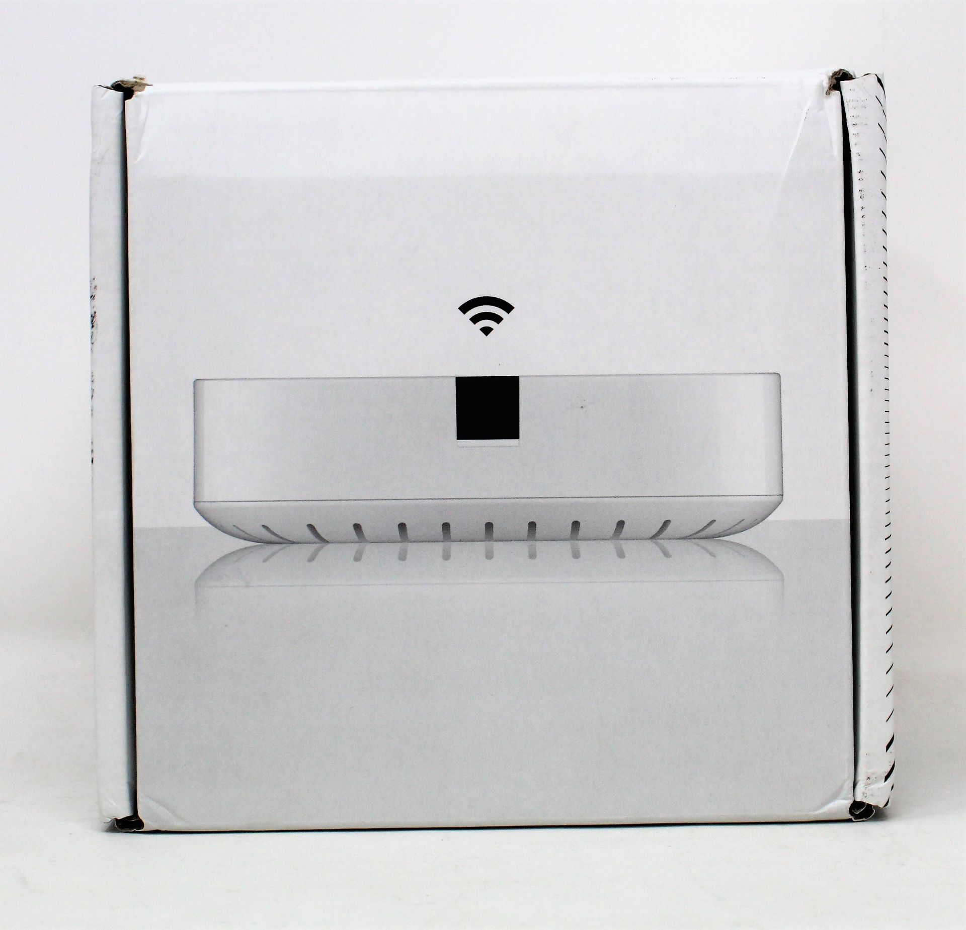 A pre-owned boxed Sonos Boost wi-fi range extender in white