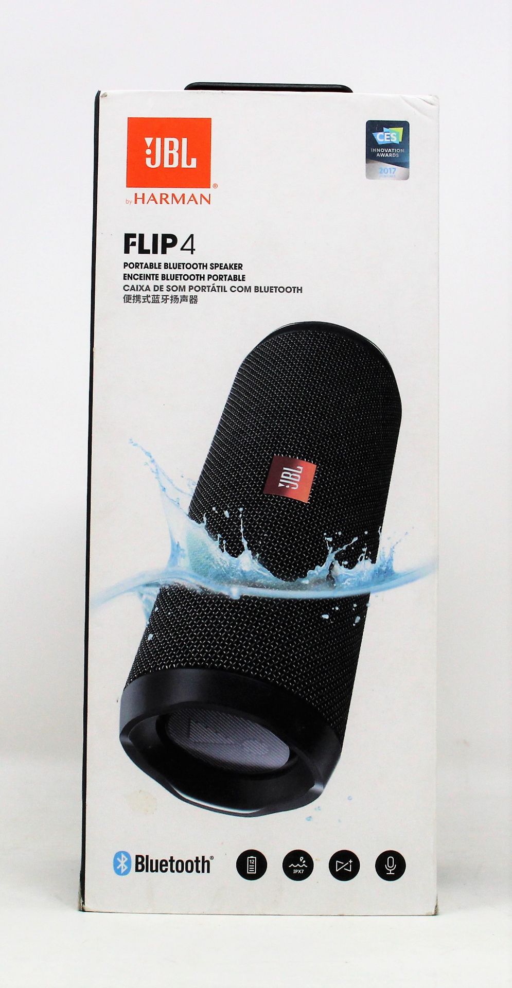 A boxed as new JBL Flip 4 portable bluetooth speaker in black (box opened)