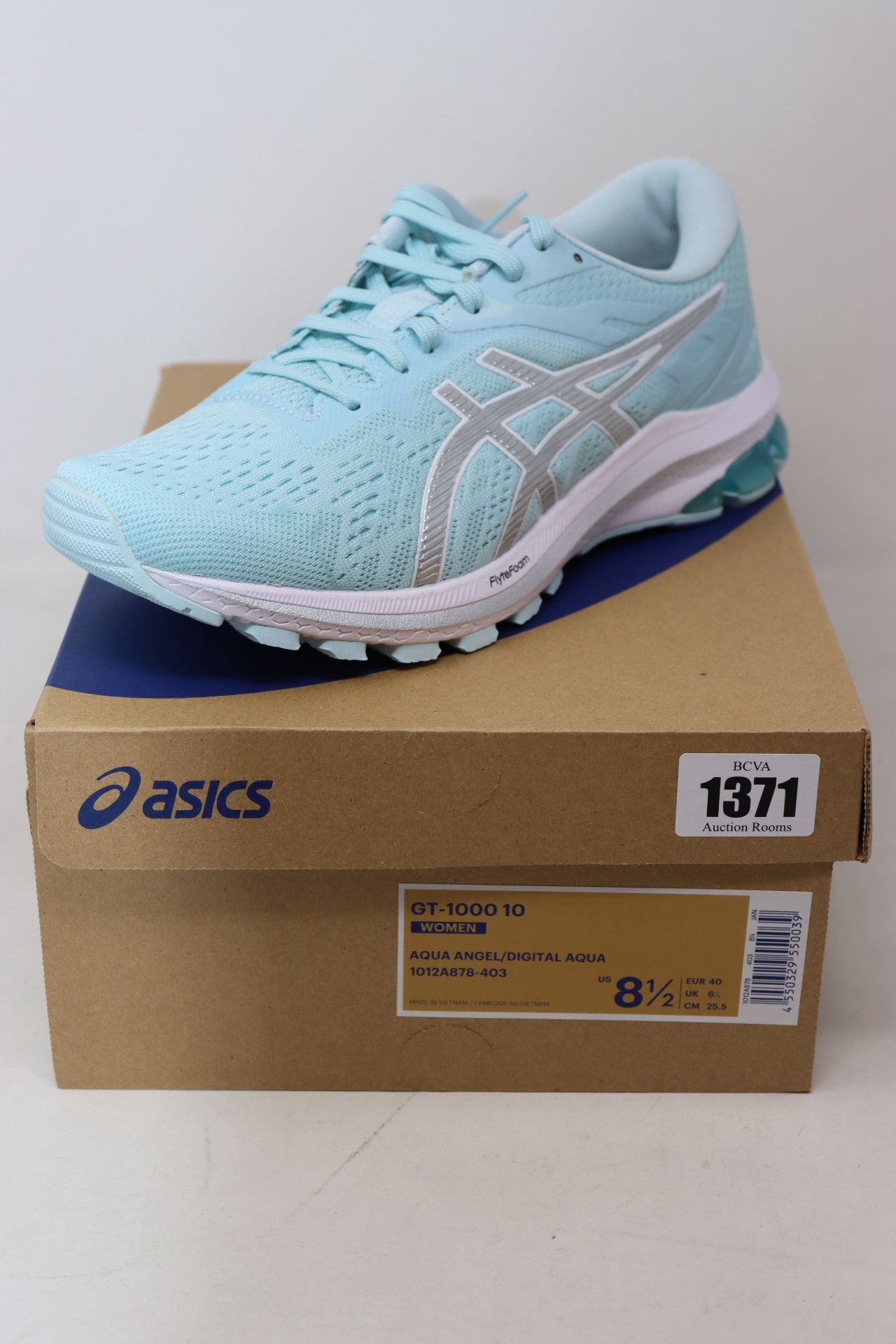 A pair of women's as new Asics GT-1000 10 trainers (UK 6.5).