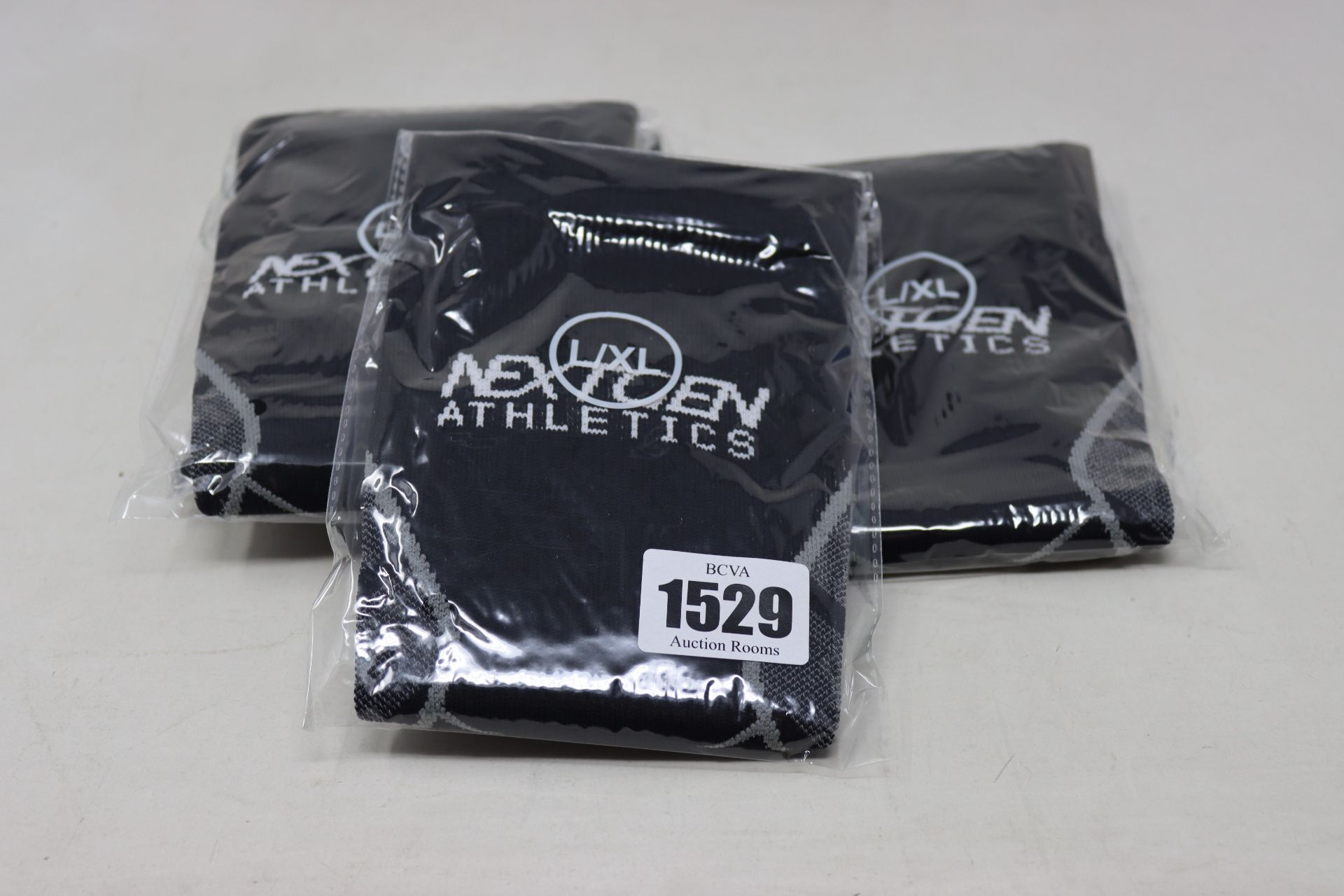 A quantity of as new Nextgen Athletics Essential calf compression sleeves (Approximately 40 pairs).