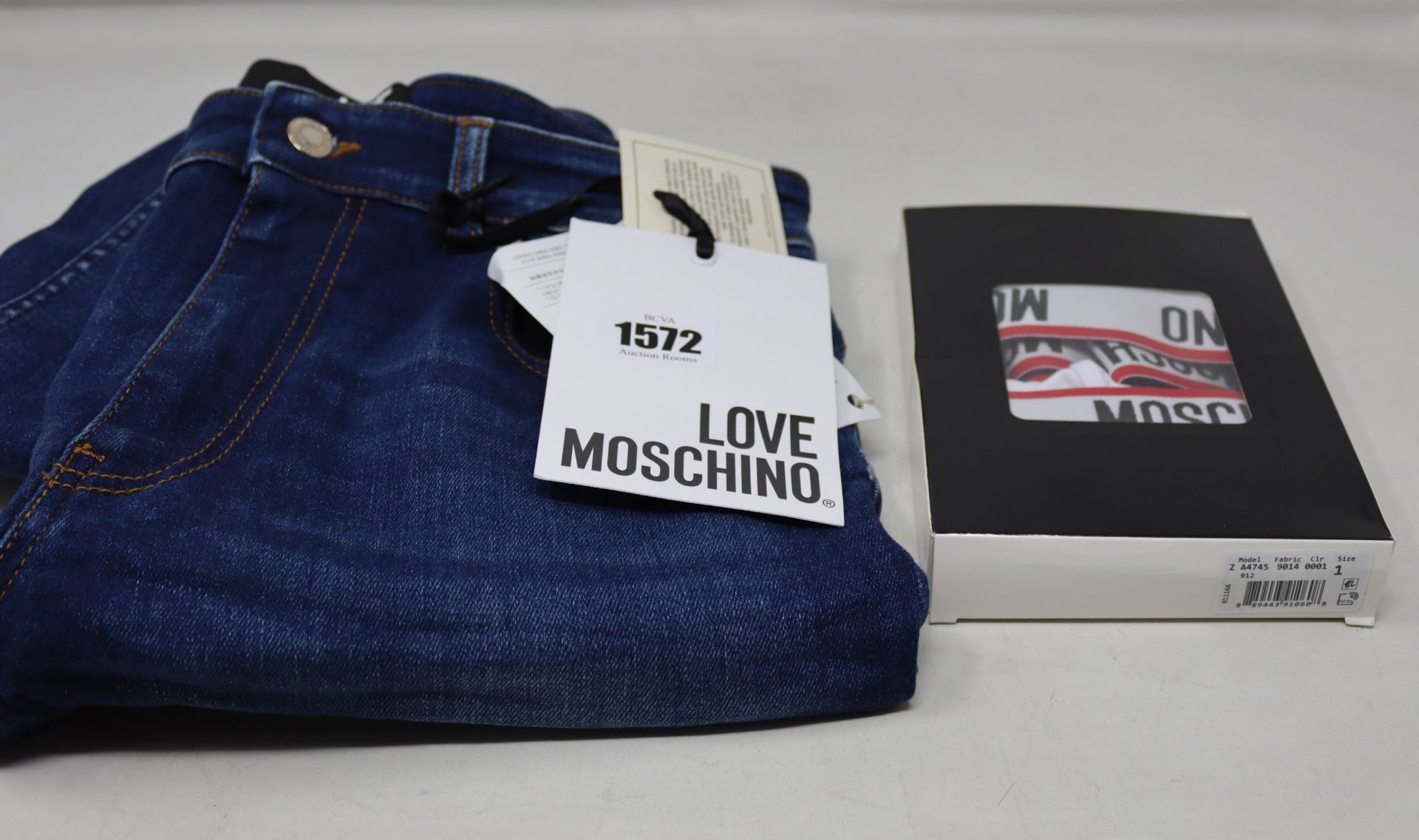 A pair of as Love Moschino jeans (Size 31) and a twin pack of Moschino briefs (Size 1).