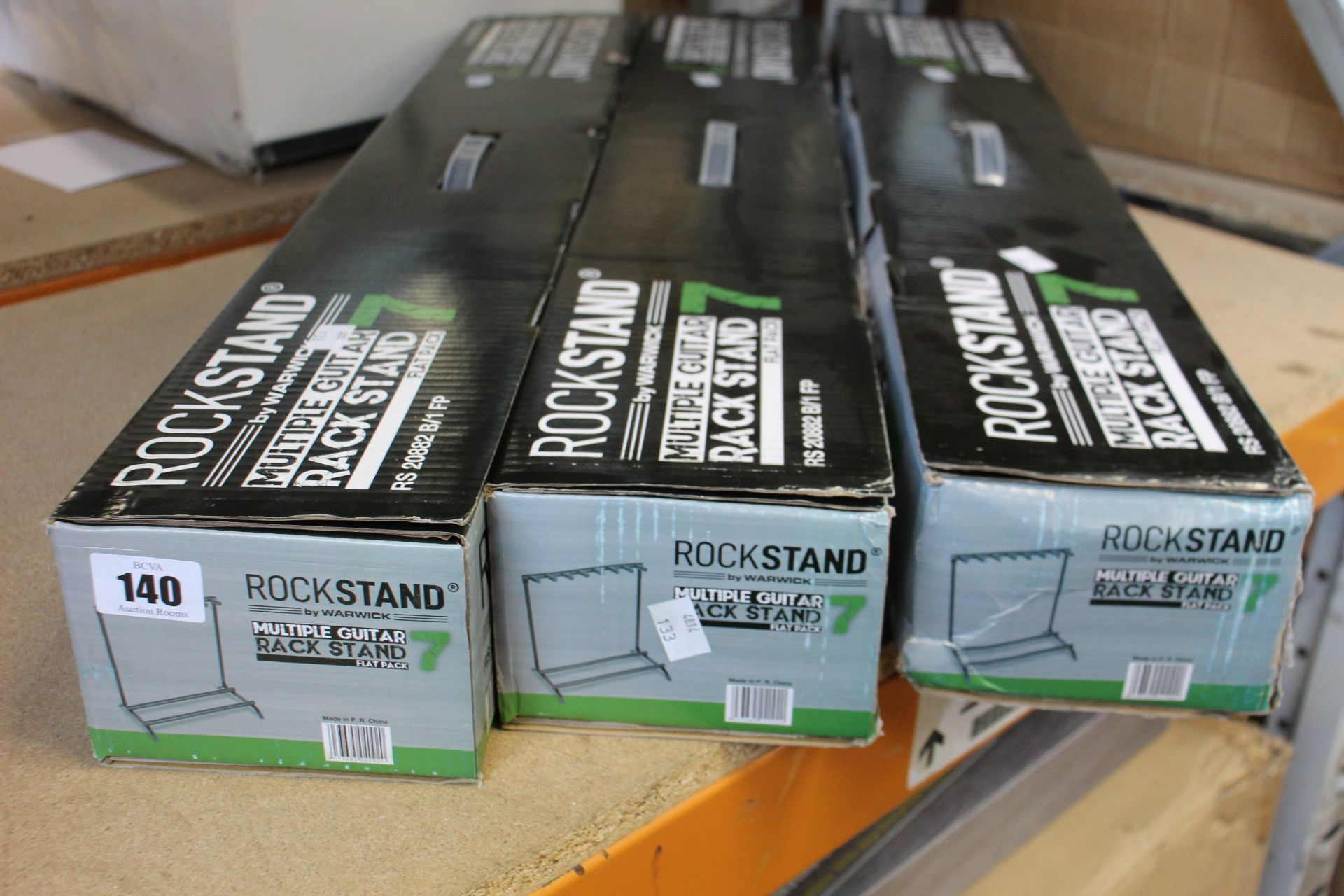 Three boxed as new Warwick Rockstand RS209882 flat pack multiple guitar stands.