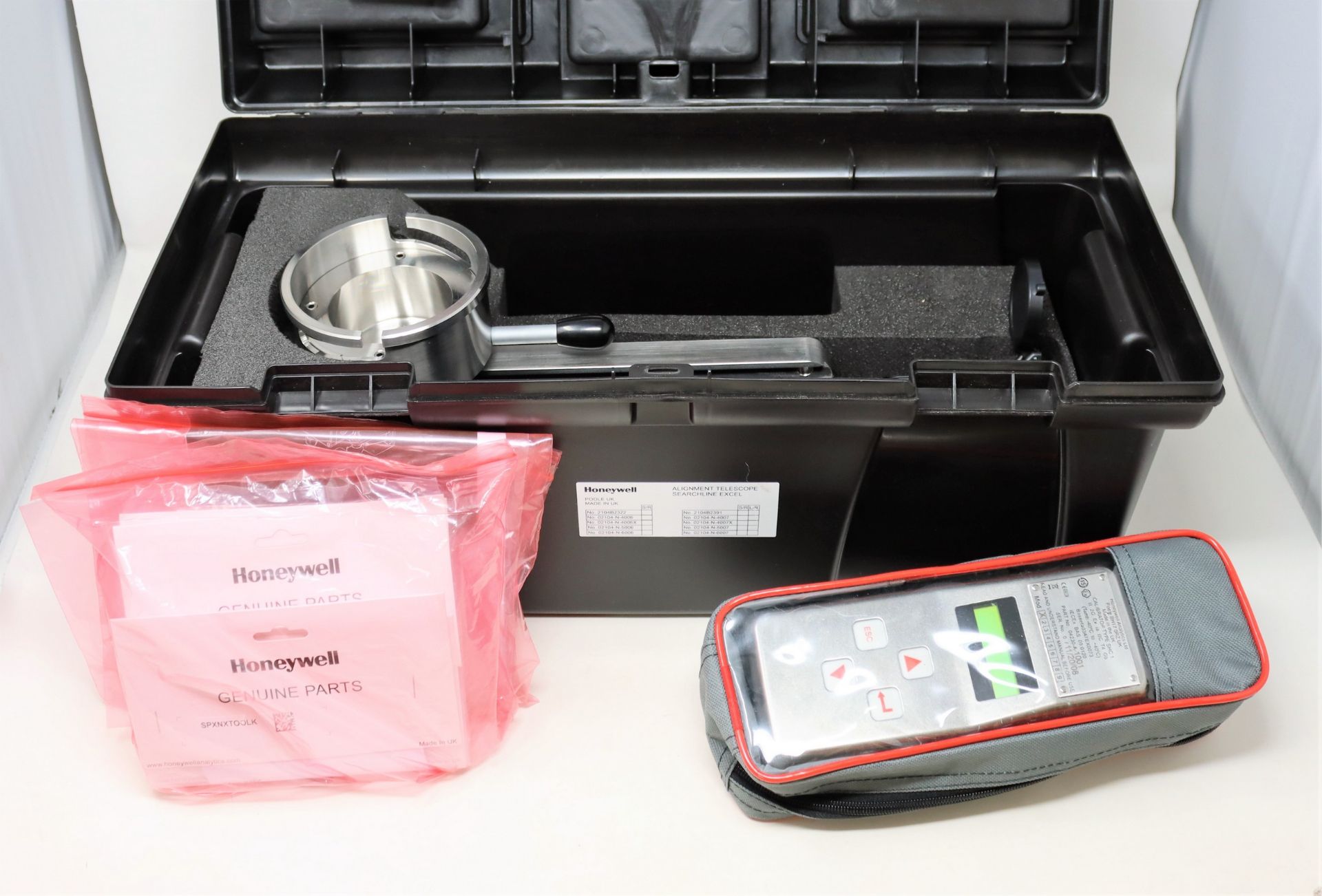 An as new Honeywell Searchline Excel alignment and conformity kit including handheld interrogator (