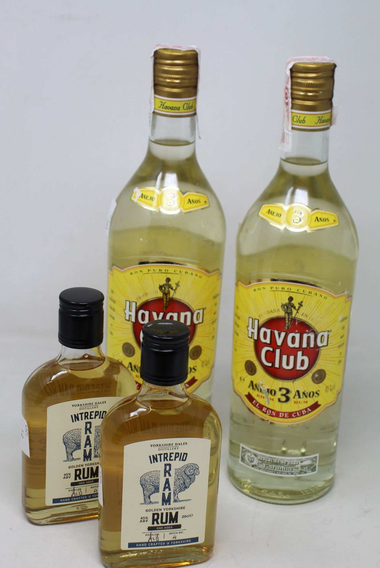 Three bottles of Havanna Club rum (1ltr) and two Intrepid Ram rum (200ml) (Over 18's only).