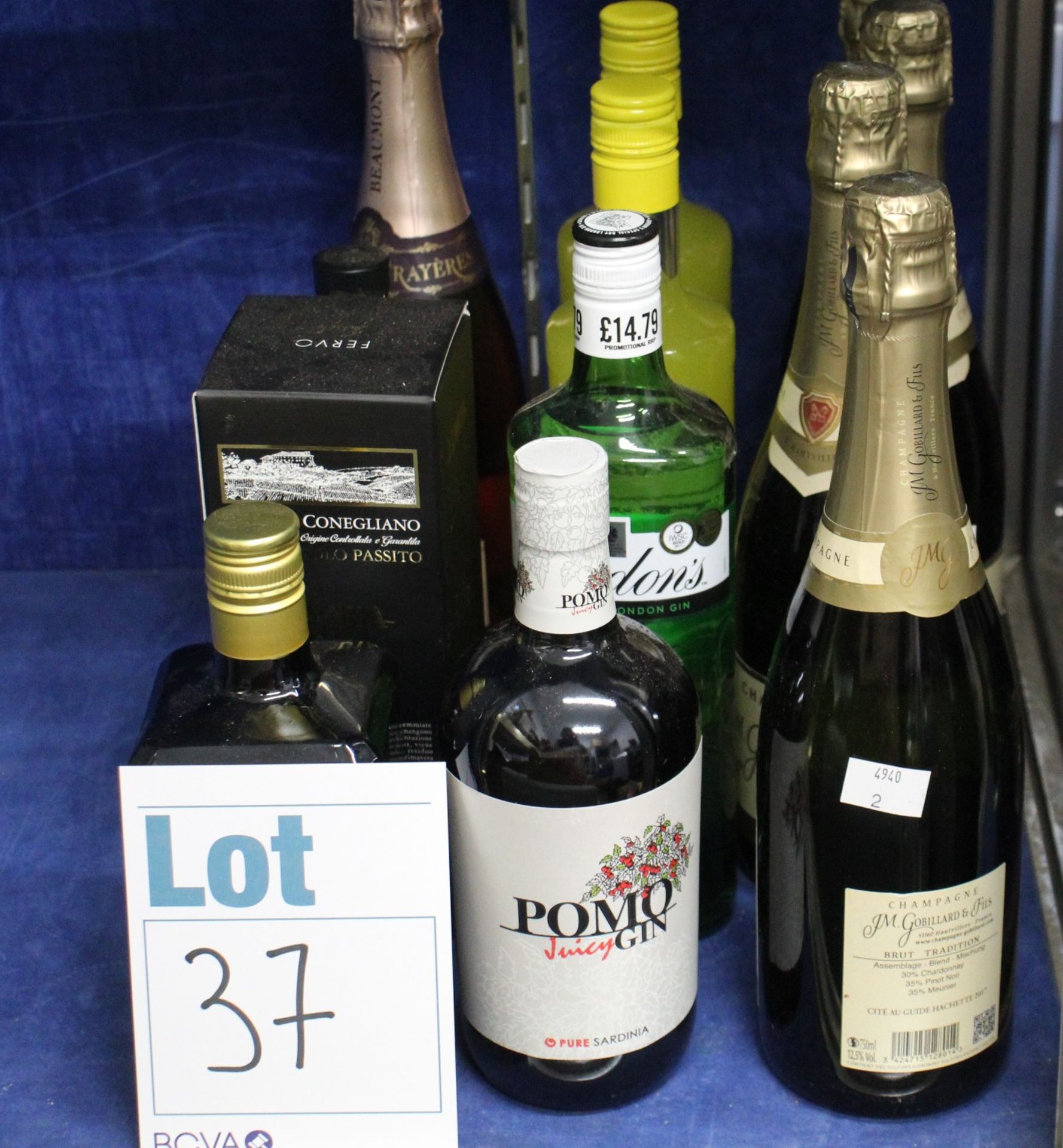 Four bottles of J M Gobillaro & Fils champagne (4 x 750ml) and eight bottles of assorted spirits