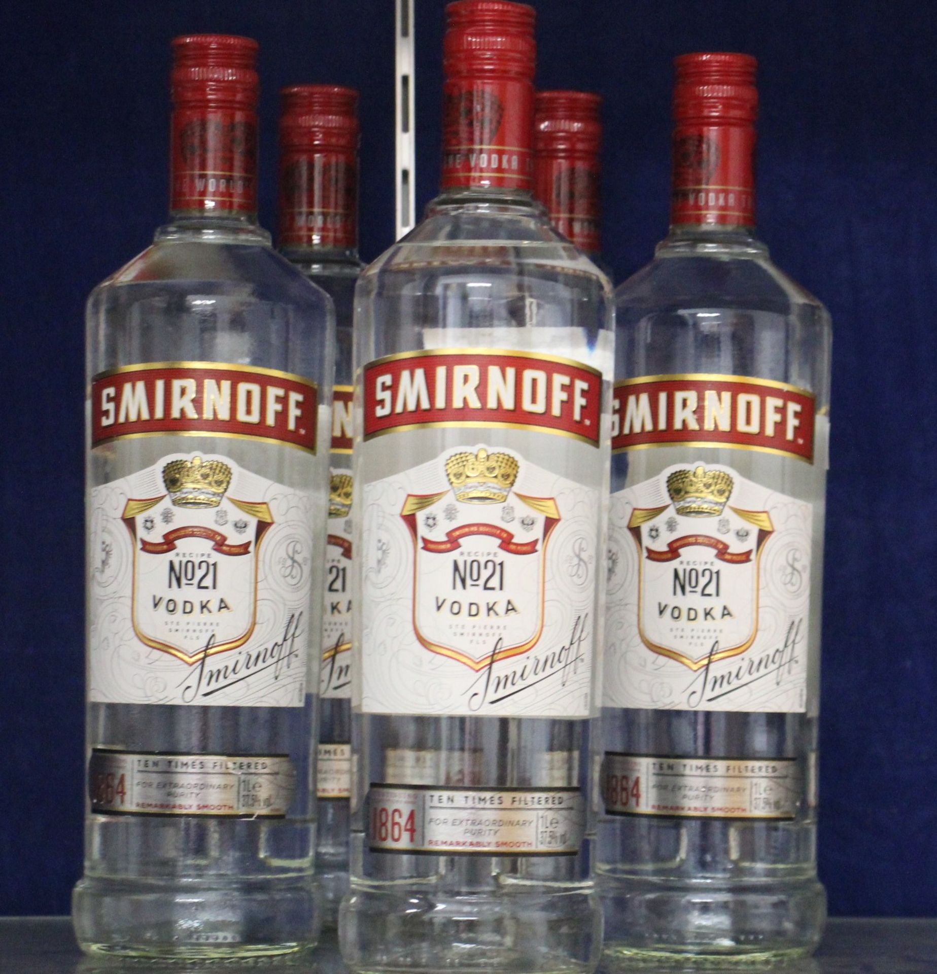 Five bottles of Smirnoff Vodka's ( 5 x 1ltr) (Over 18's only).