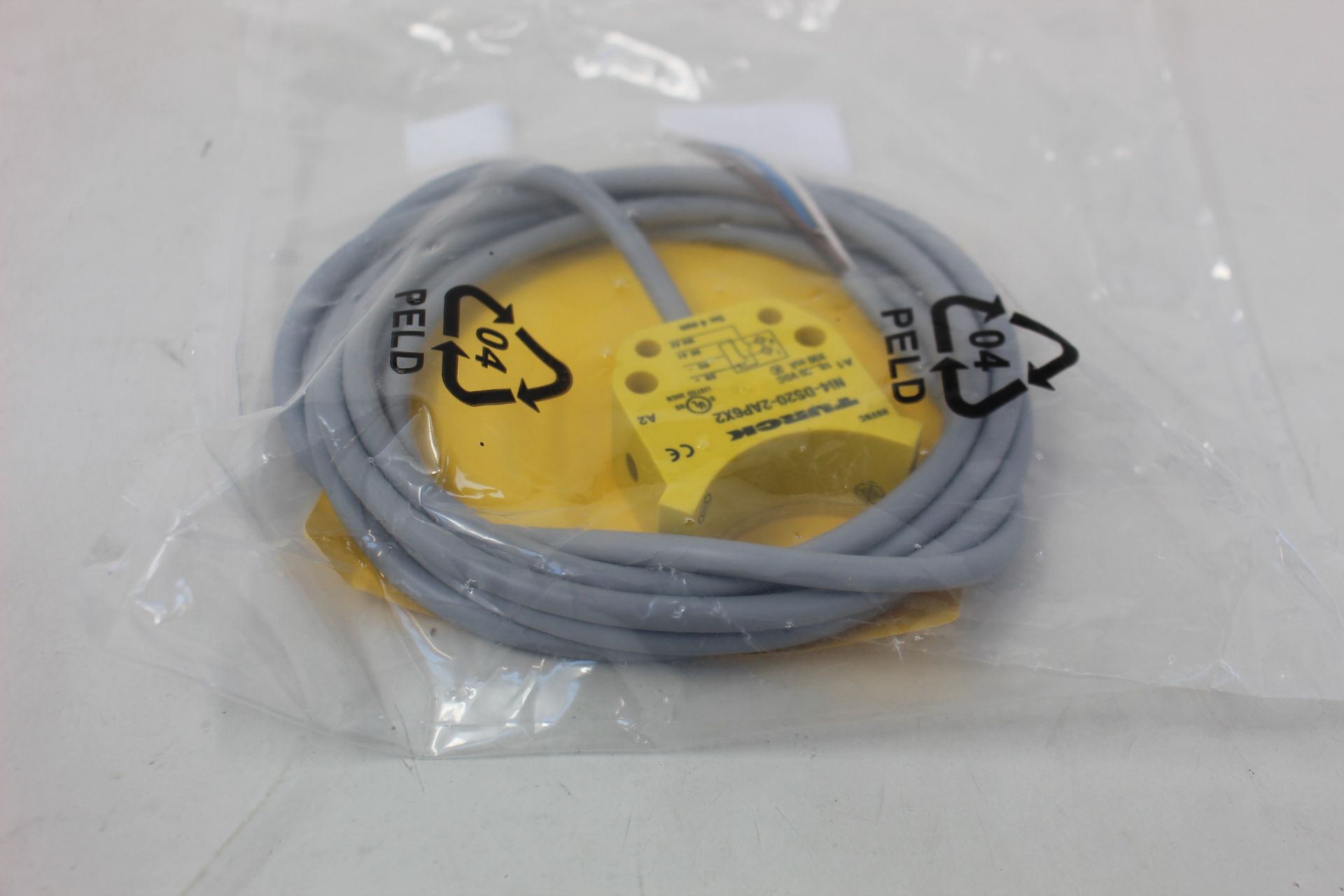 An as new Turck inductive proximity sensor (Ni4-DS20-2AP6X2, 165022).