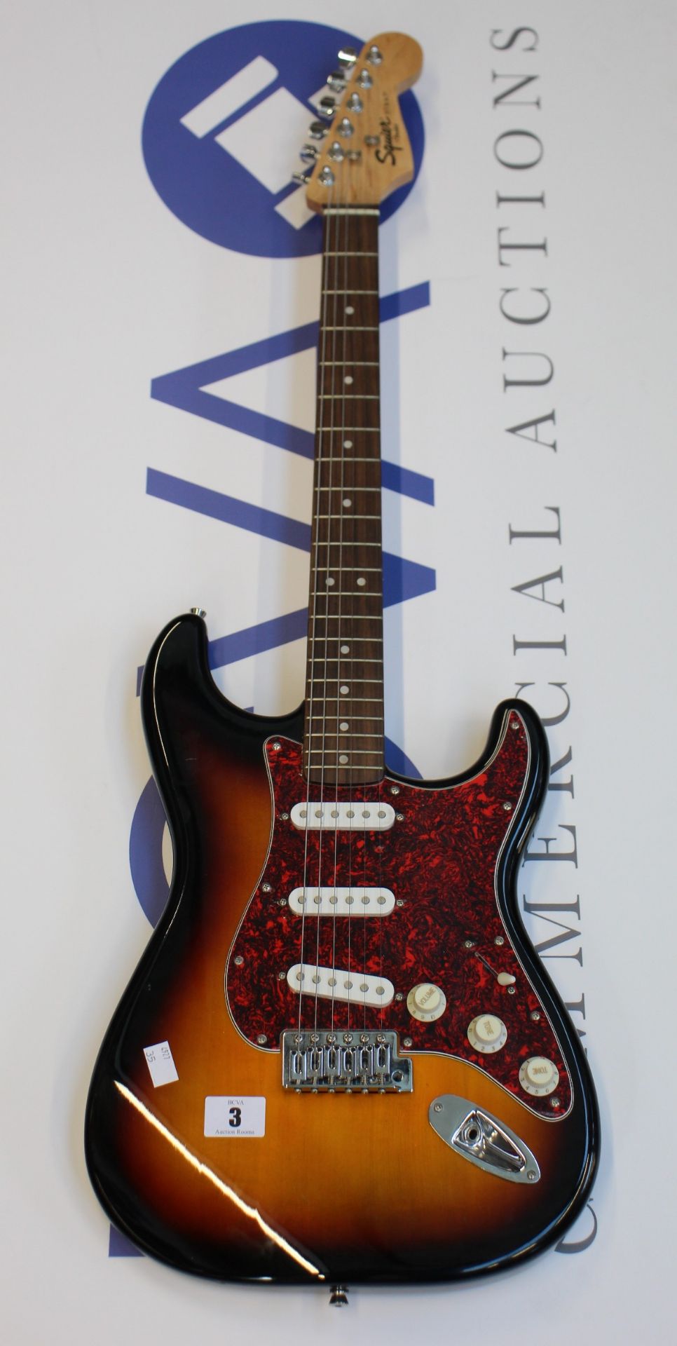 A pre-owned Fender Affinity Series Stratocaster electric guitar.