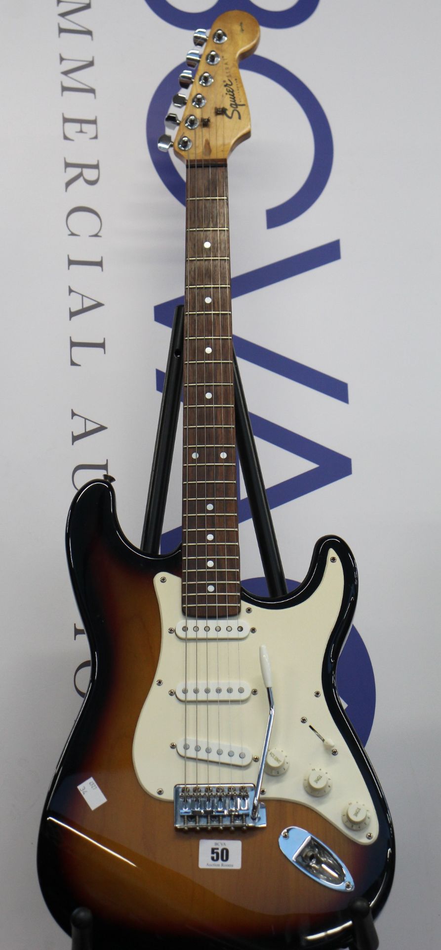 A pre-owned Fender Affinity Series Stratocaster electric guitar.