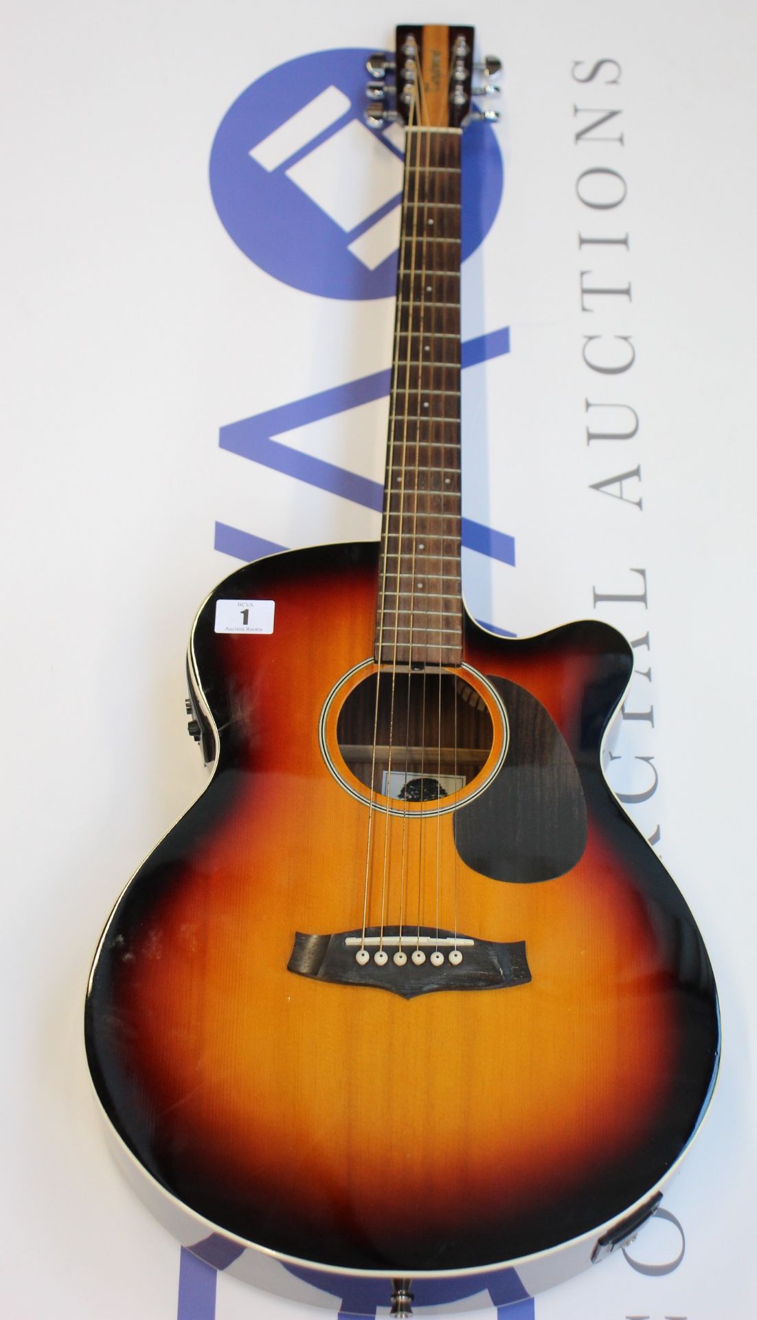 A pre-owned Tanglewood electric acoustic guitar with case.