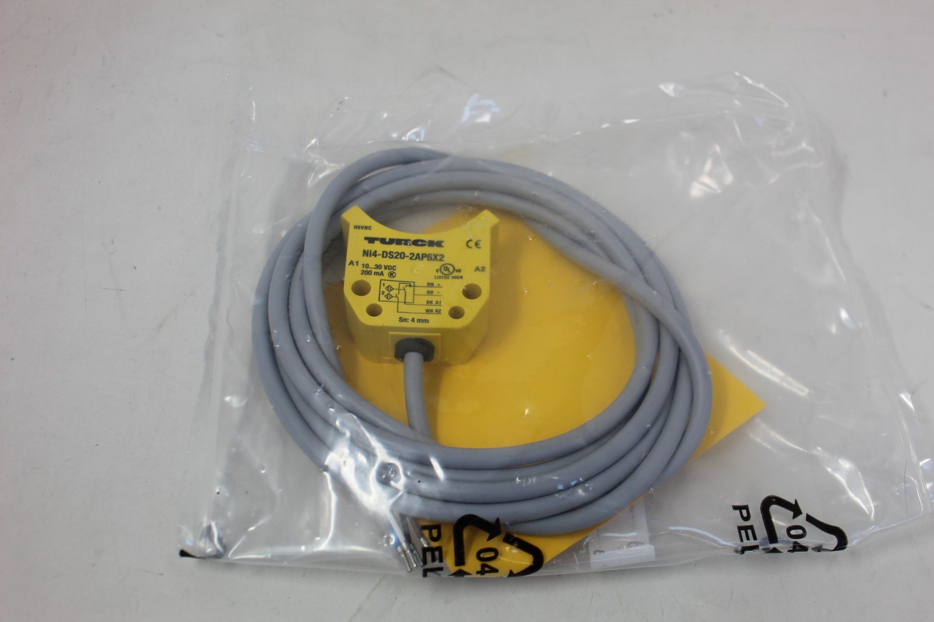 An as new Turck inductive proximity sensor (Ni4-DS20-2AP6X2, 165022).