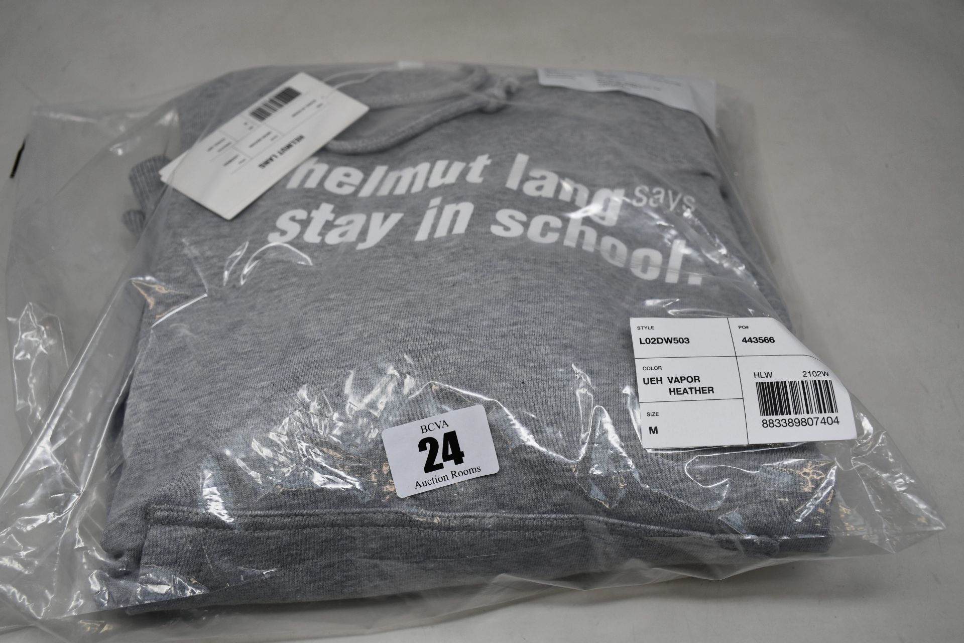 An as new Helmut Lang "Says Stay in School" hoodie in grey (M).