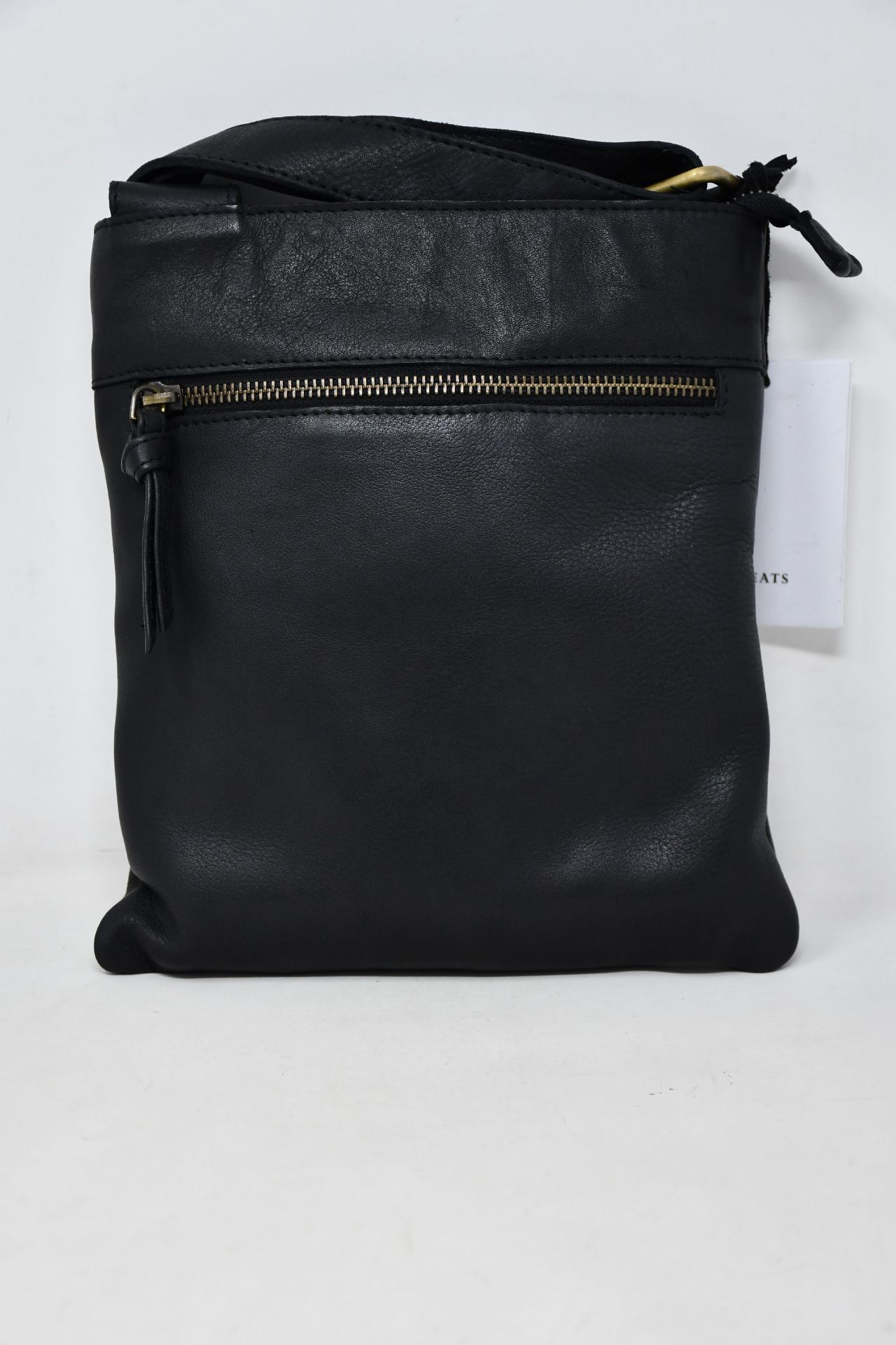 An as new Treats Kamma Common leather bag in black.