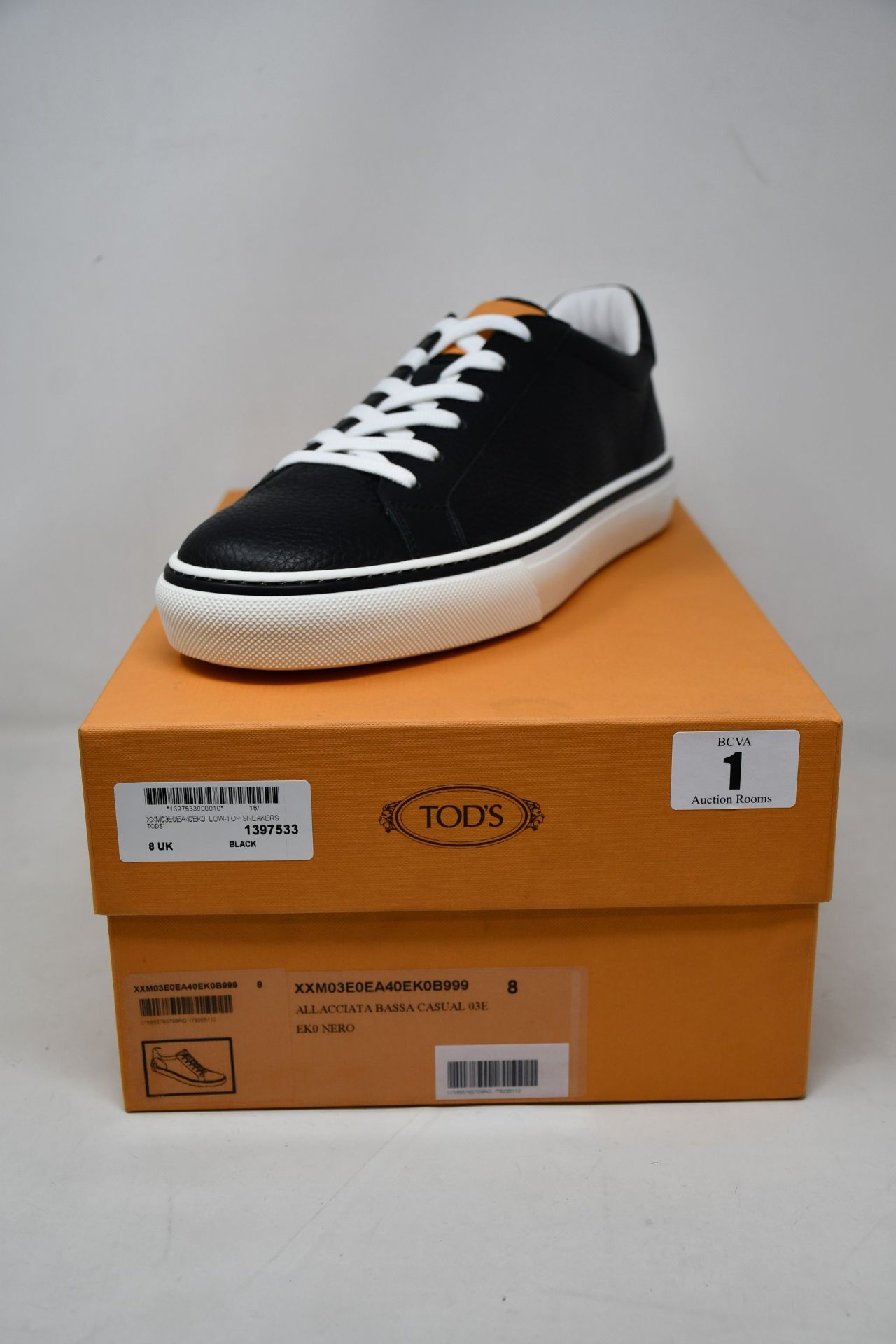 A pair of as new boxed Tod's Allacciata Bassa casual sneaker in black (UK 8).