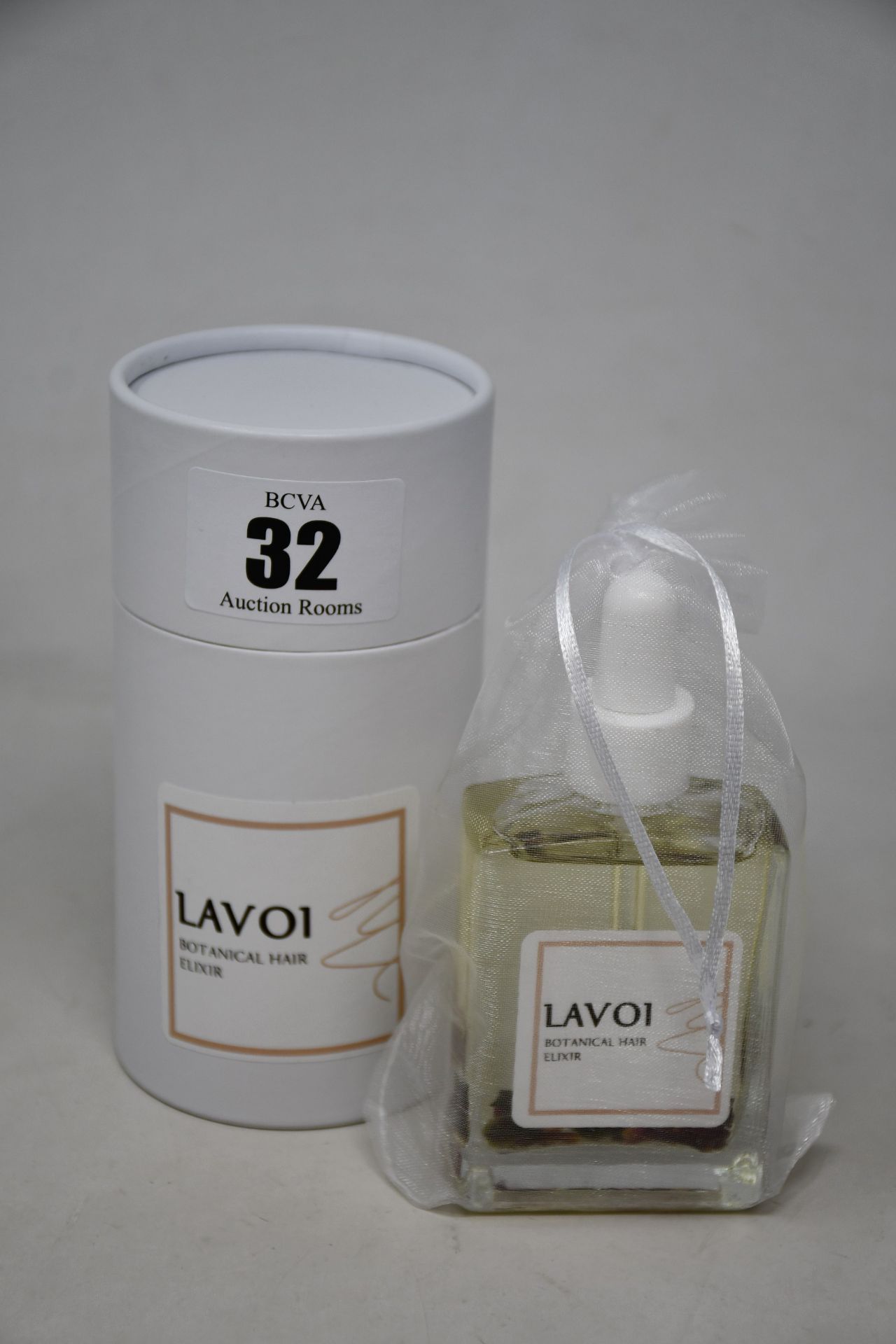 An as new LAVOI Botanical Hair Elixir Oil (Healthy Scalp and Hair Oil - Hydrating Serum for