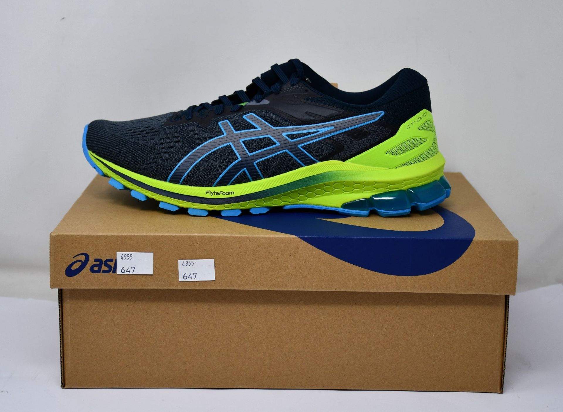 A pair of as new Asics GT-1000 10 trainers (UK 8).