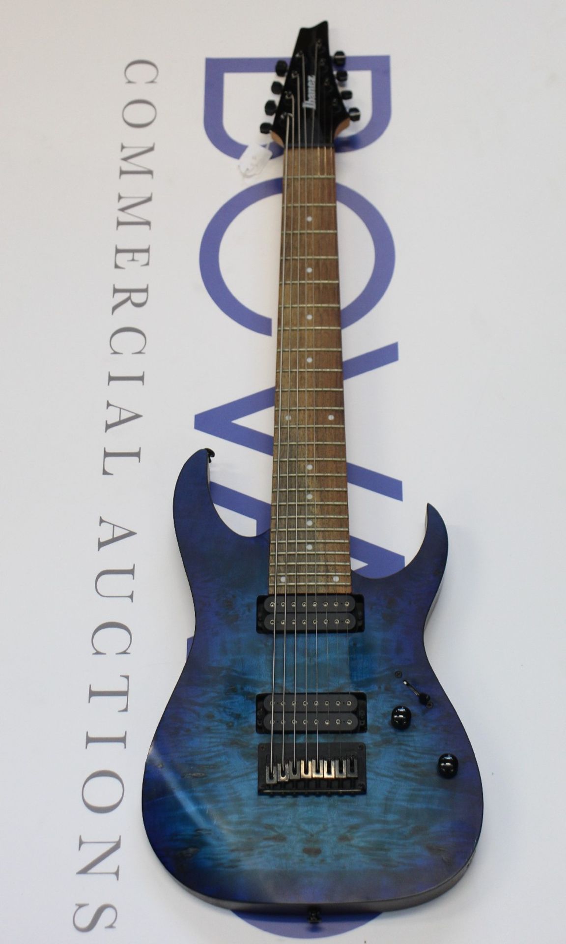 An Ibanez Sapphire Blue Flat 8-string electric guitar (RG8PB-SBF).