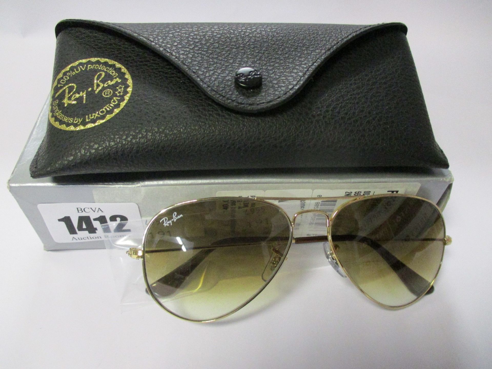 A pair of as new Ray Ban Aviator large metal sunglasses.
