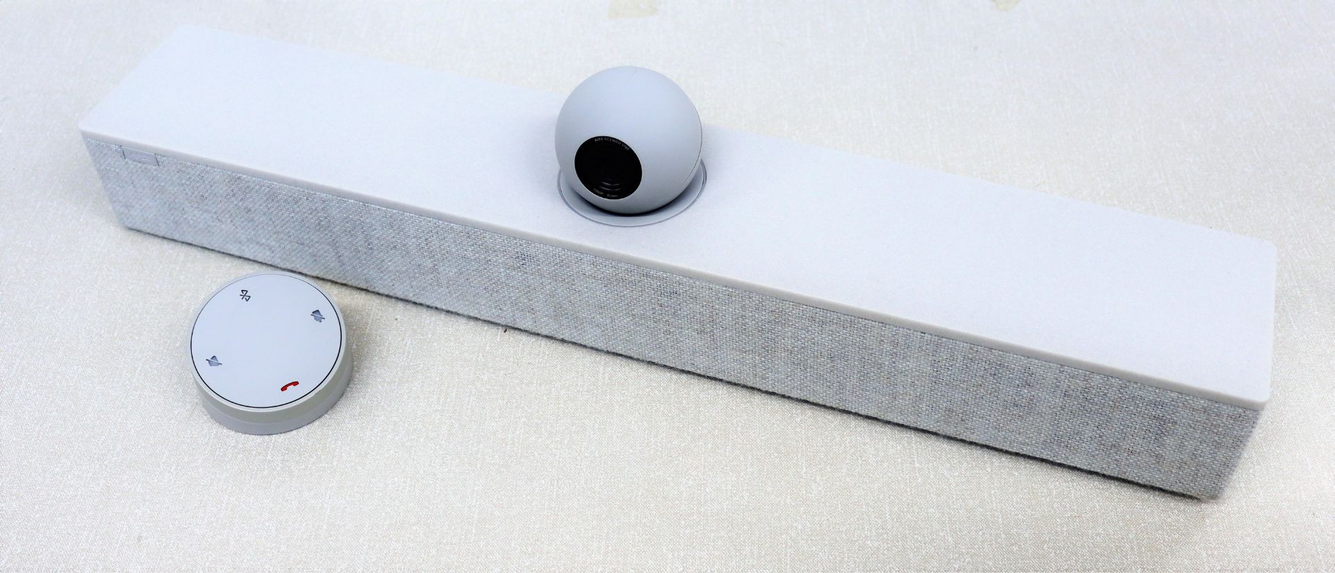 An AMX/harmon Acendo Vibe Conferencing Sound Bar with Camera in white/grey. (damage to camera shell)