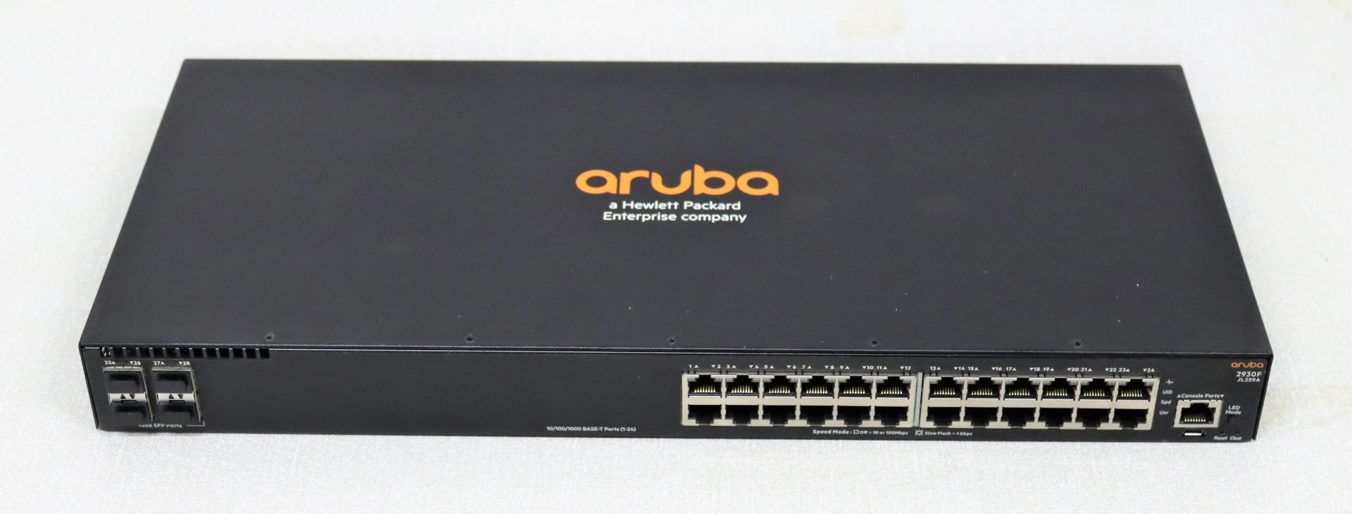 Two pre-owned HP Aruba 2930F (JL259A) 24-Port managed switches in black.